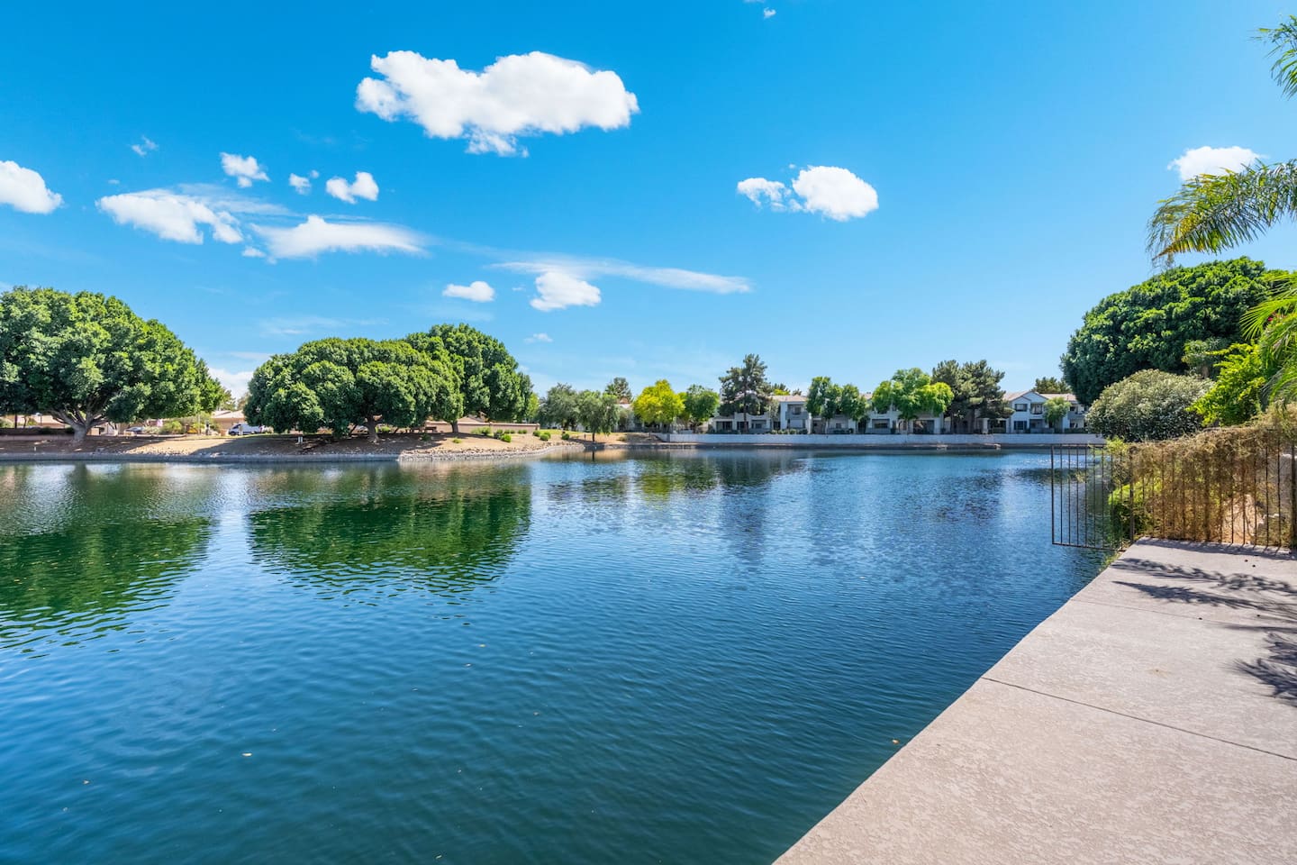 The wide, open lake view from the property's edge is a constant reminder of just how special this location is — serene, spacious, and exclusively yours to enjoy.