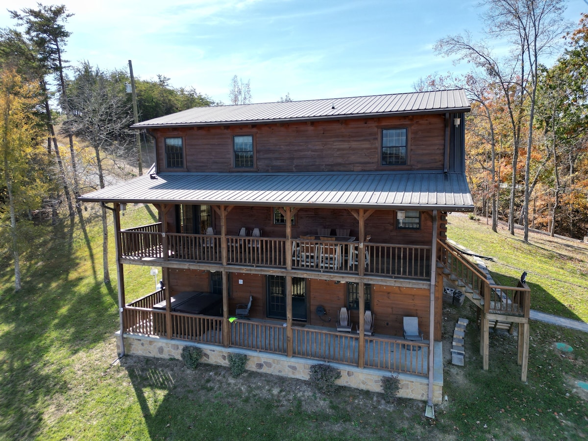 Enjoy a drink in a rocker or a meal or game of cards on the large table on the top porch. Enjoy the hot tub or relaxing on the rockers on the bottom porch. 