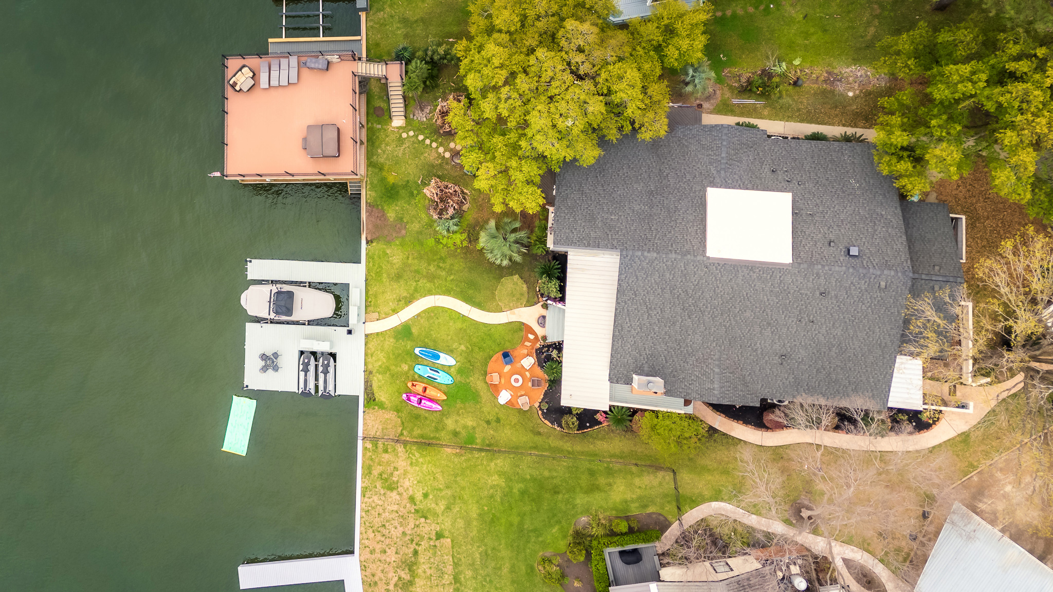 Everything you need for lakefront fun—kayaks, a boat dock, fire pit, and room to roam—all just steps from your back door.