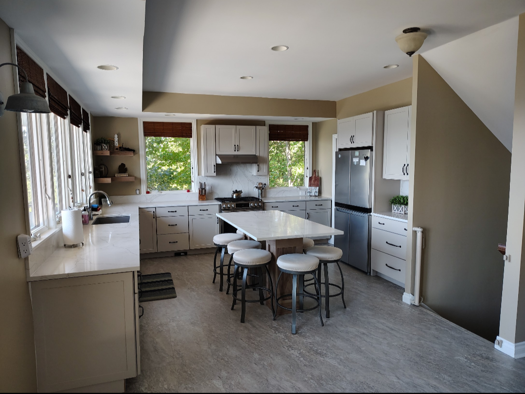 Kitchen with large island & bar stools