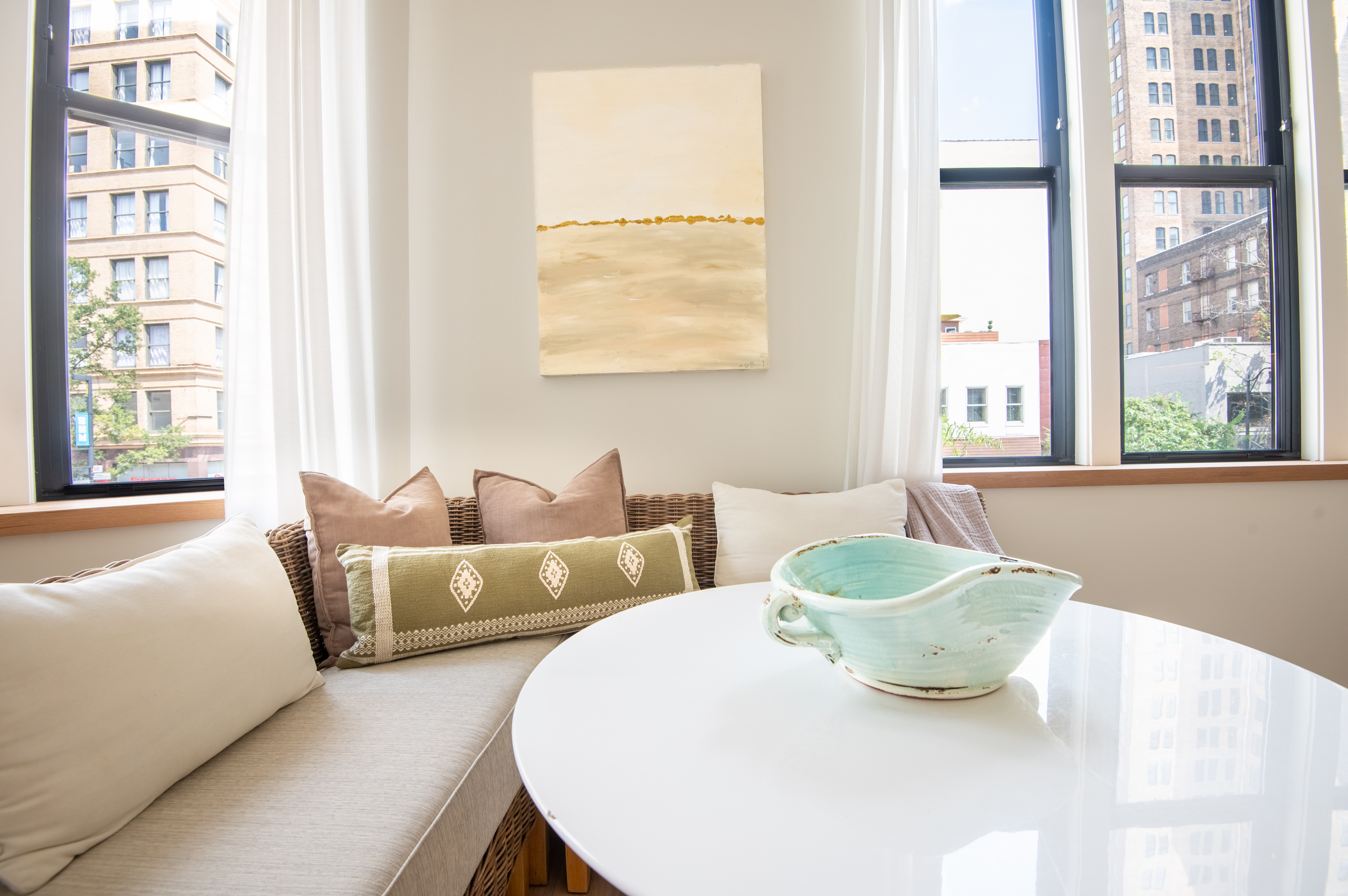 Dining nook with elegant seating and city views
