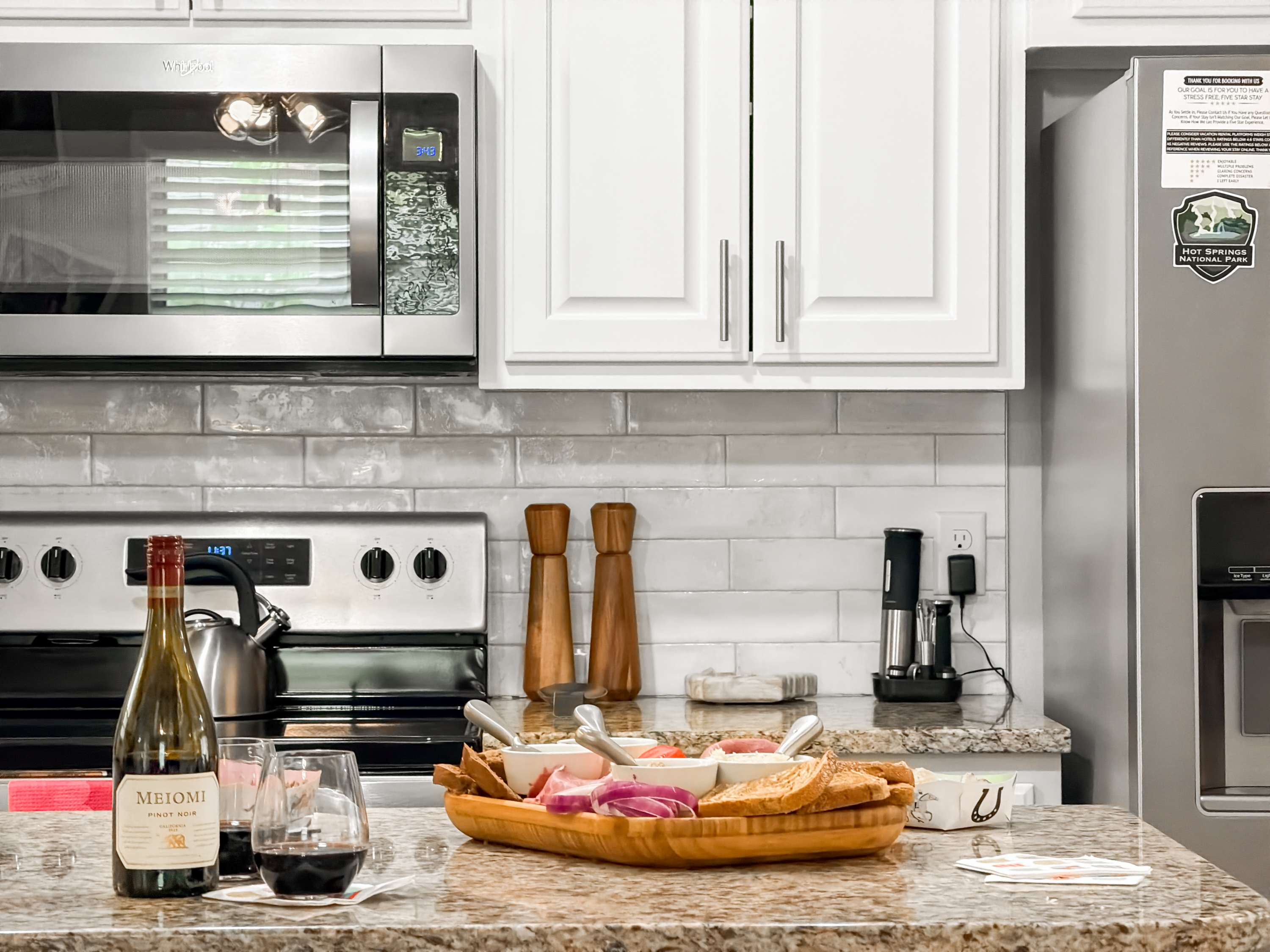 With a Keurig drip/pod coffee machine and stainless steel appliances.
