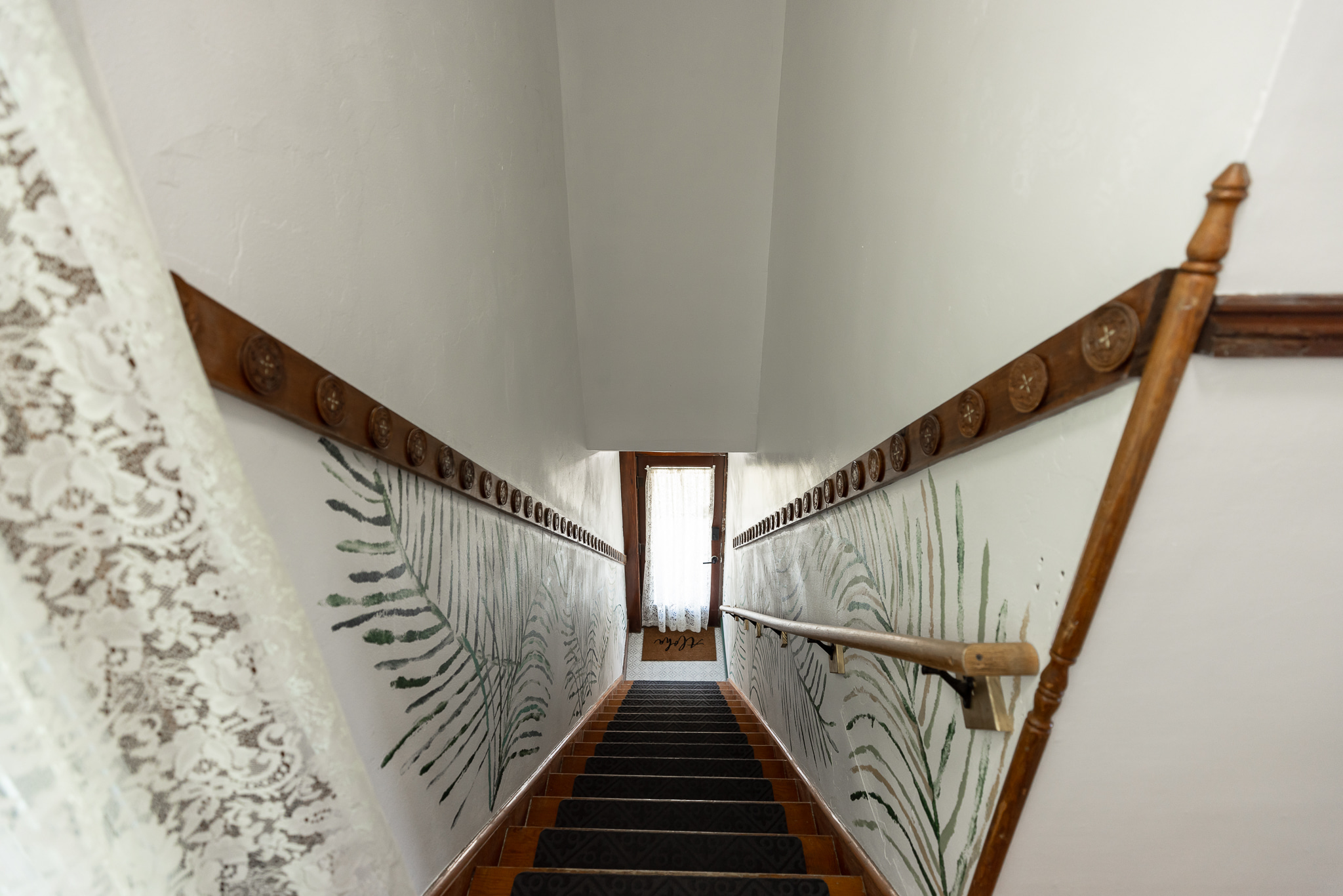 Original trim adds a unique touch to the hallway.