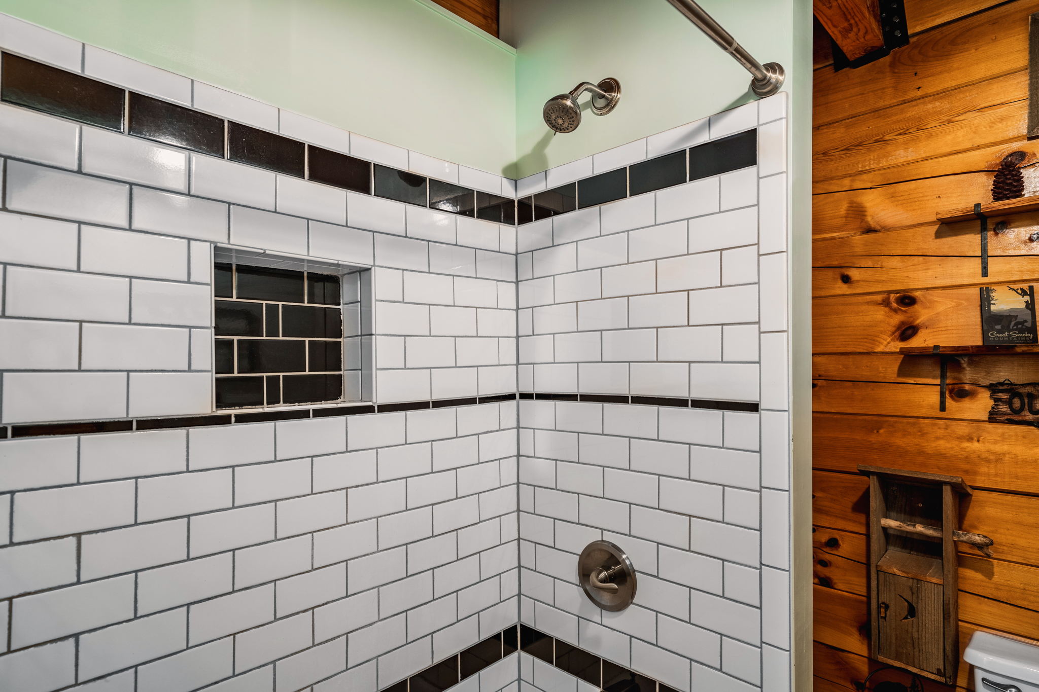 Full bathroom with a tub + shower combo