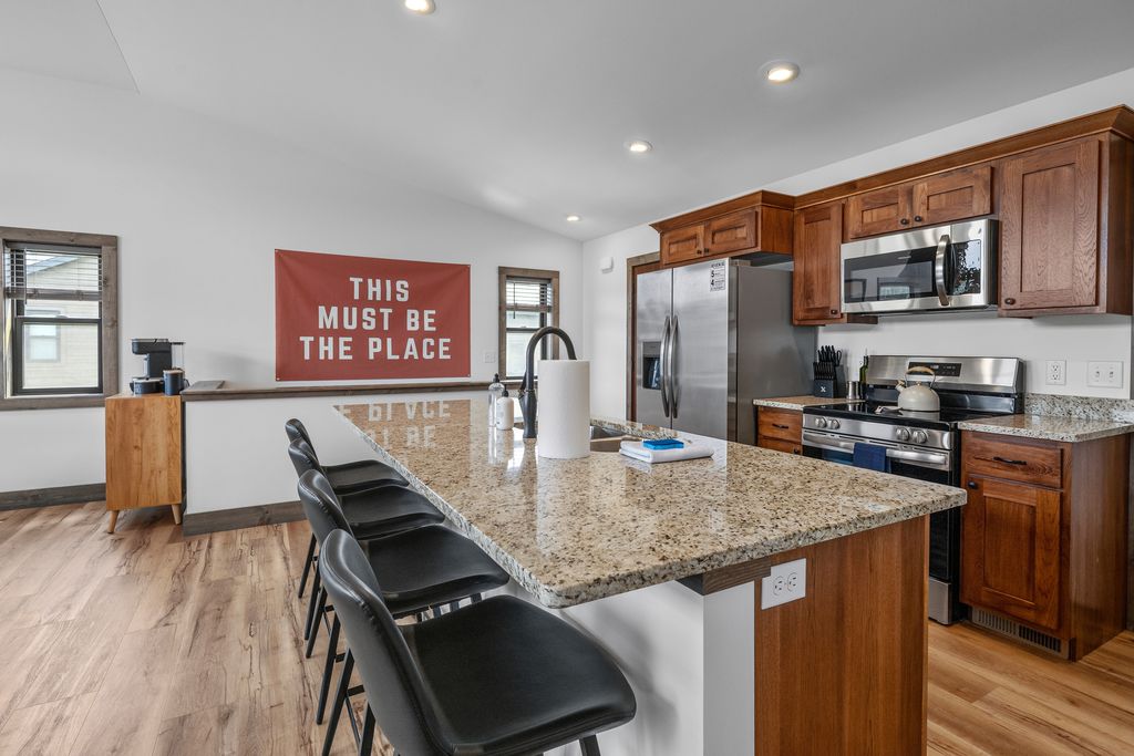 Camp kitchen with seating for four at the island