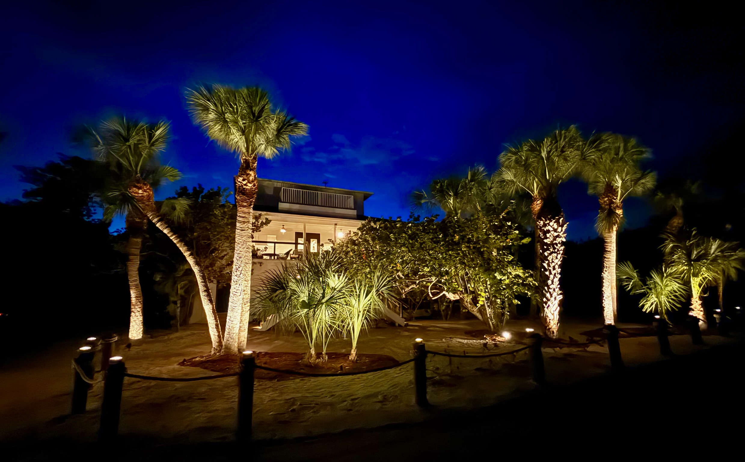 Outdoor lighting throughout the property makes Coral Castaway feel like a resort
