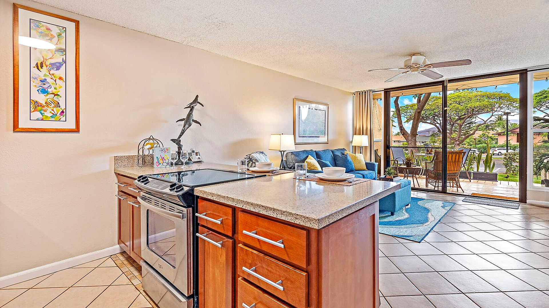 Open concept kitchen with full appliances.