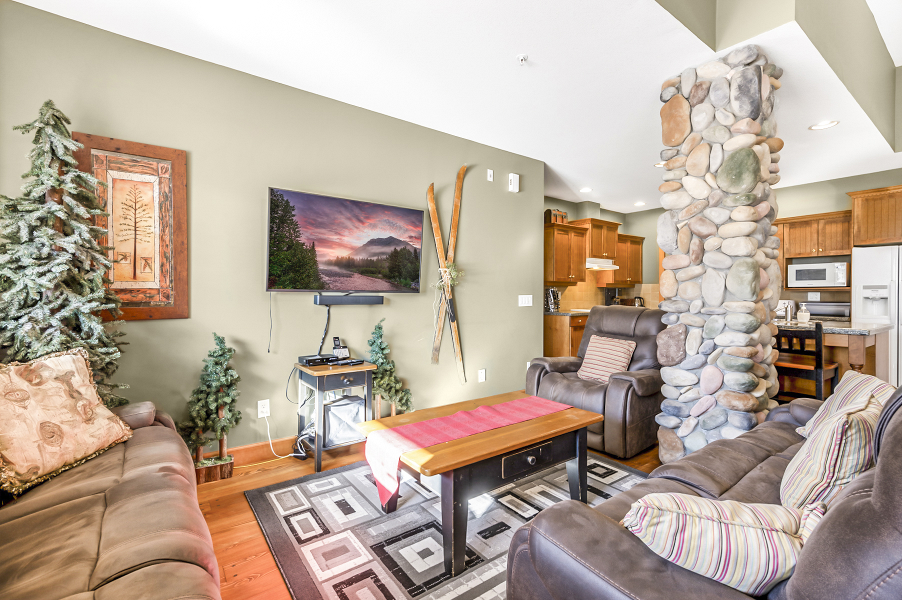 Living room with recliners and 55" TV
