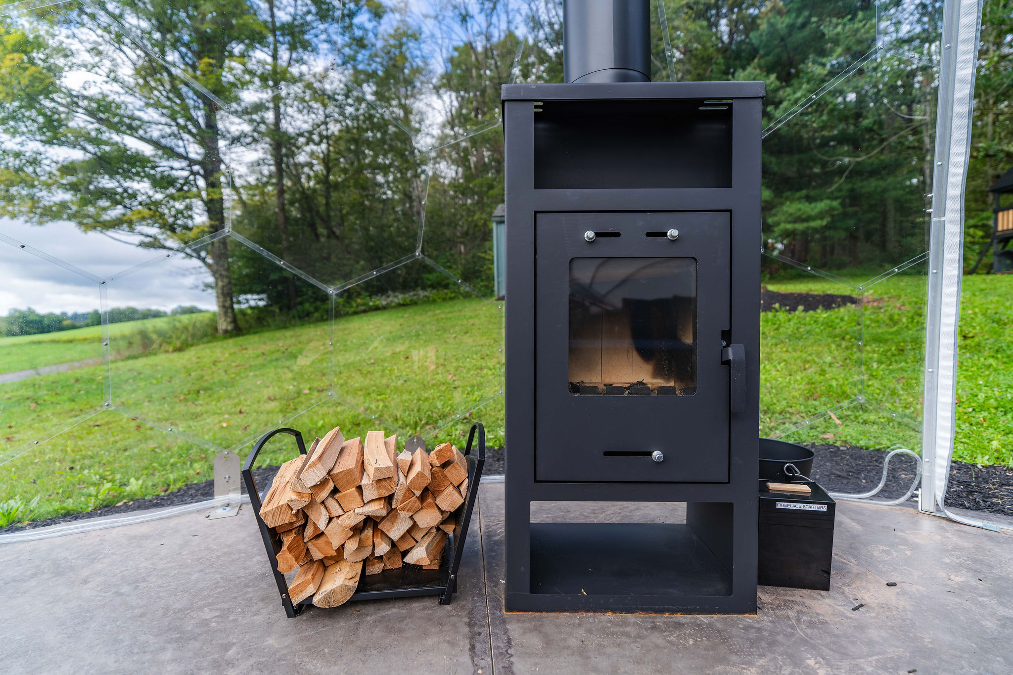🔥 Wood stove and firewood inside the dome, so it's a four-season space. (Not a sleeping space, and best avoided midday in summer.)