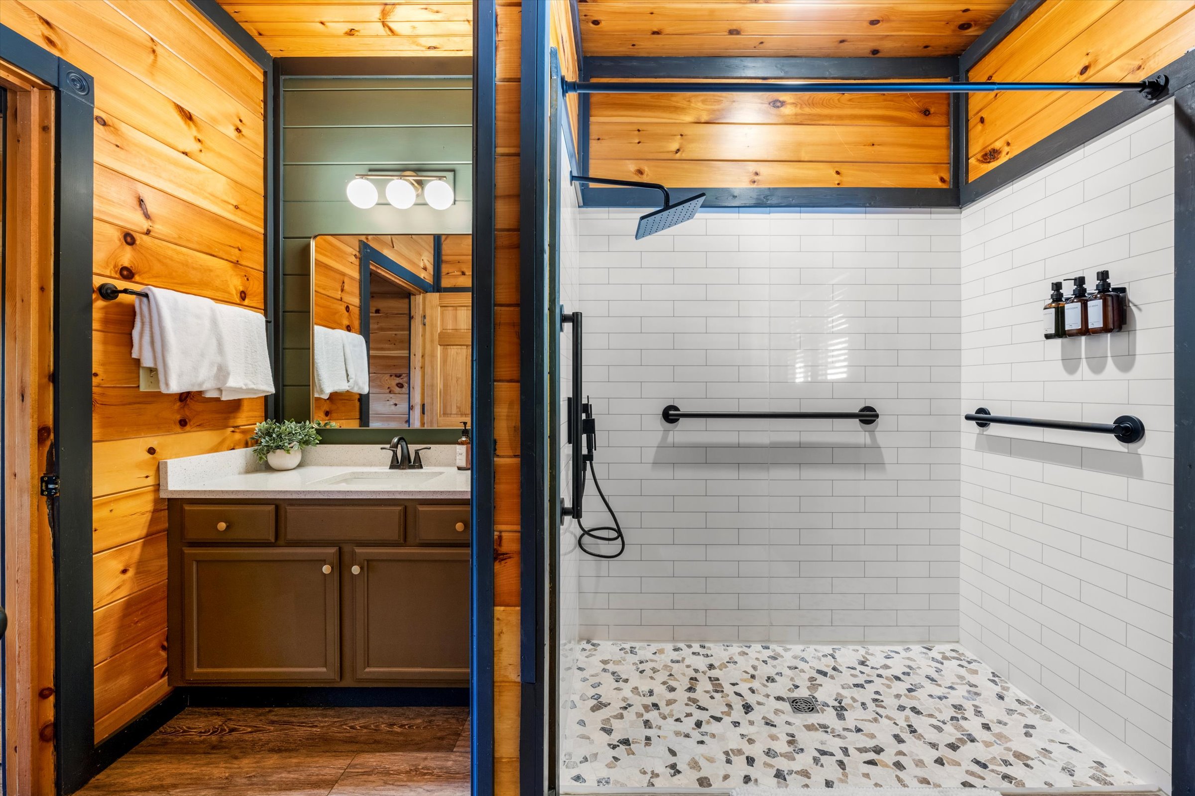 Bedroom 5 has a private handicap-accessible bathroom with roll in shower and grab bars.