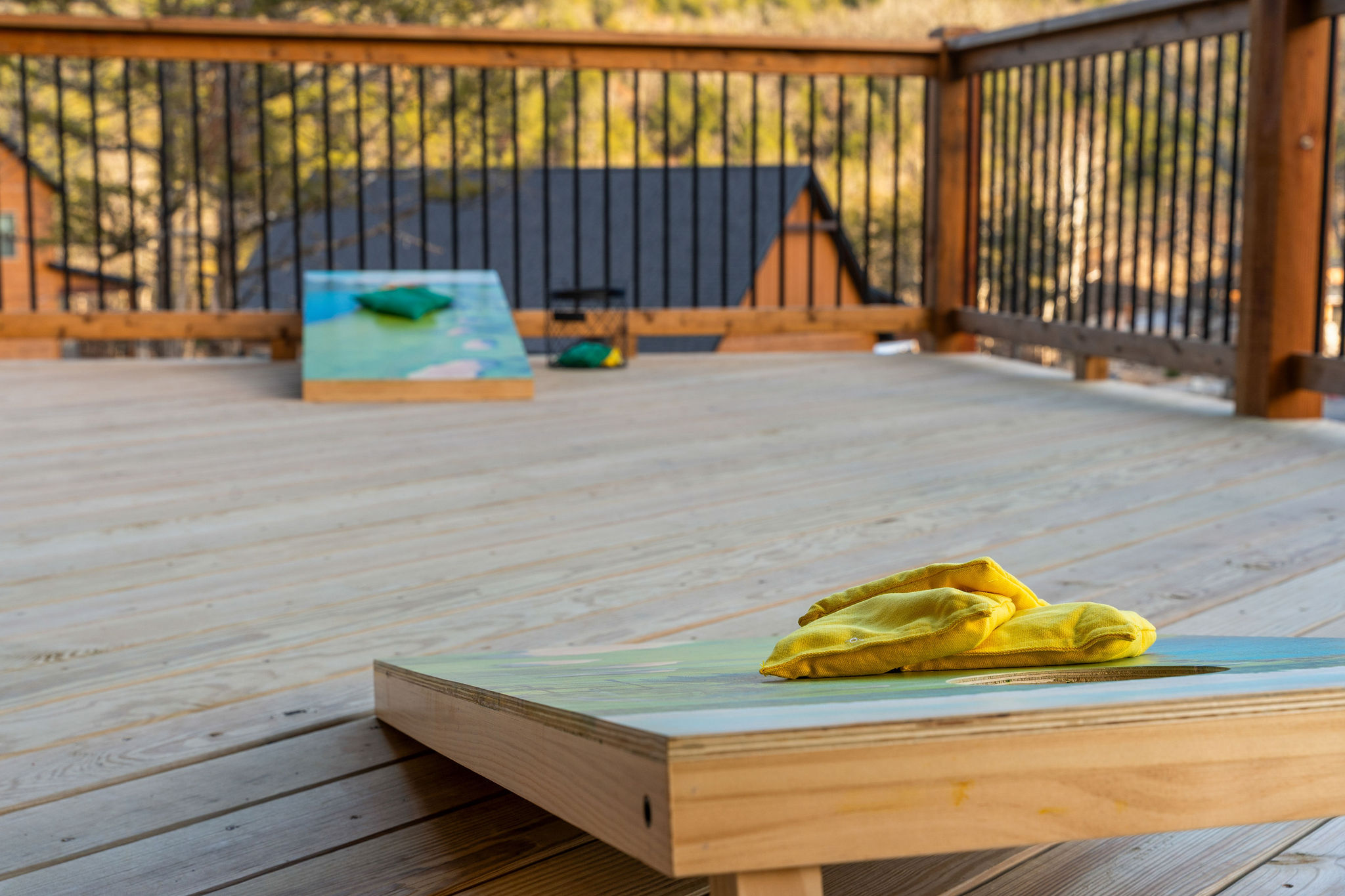 Open deck space with games for casual outdoor fun.
