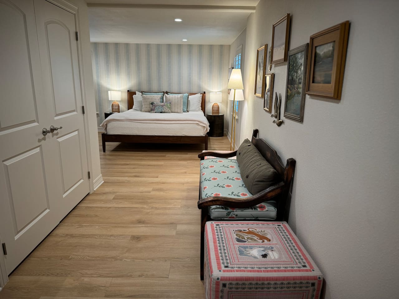 downstairs primary bedroom with king bed