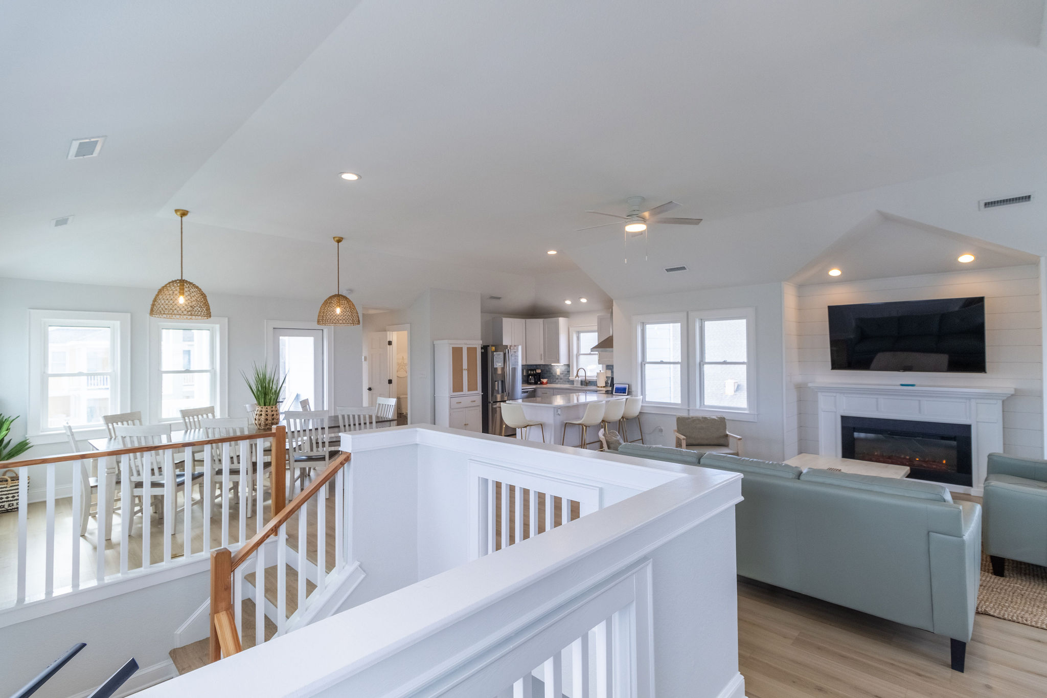 Lots of windows provide natural lighting throughout the top floor. Enjoy the sun and ocean without being outside.