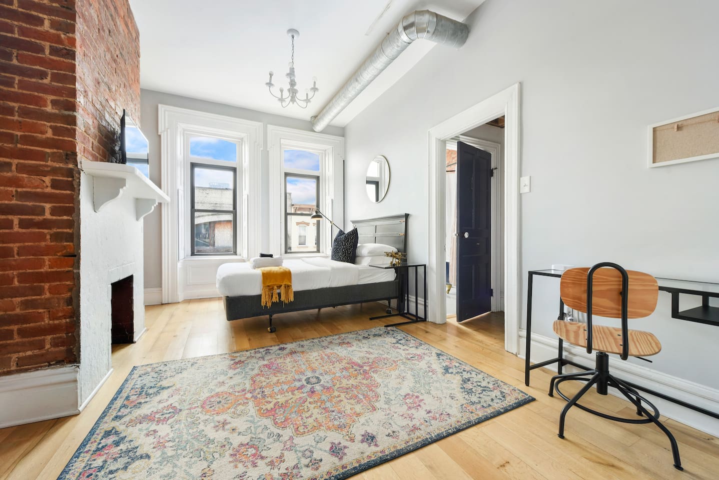 Spacious and elegant queen-sized bedroom designed for comfort and style.