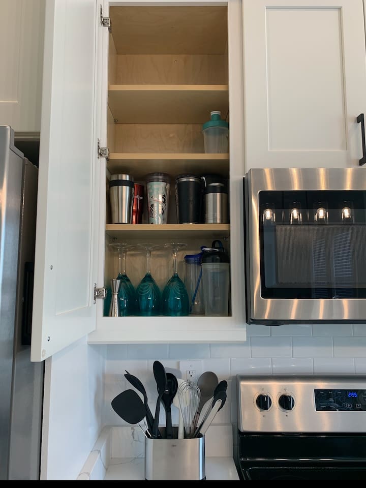 Assortment of insulated cups and additional wine glasses.  
