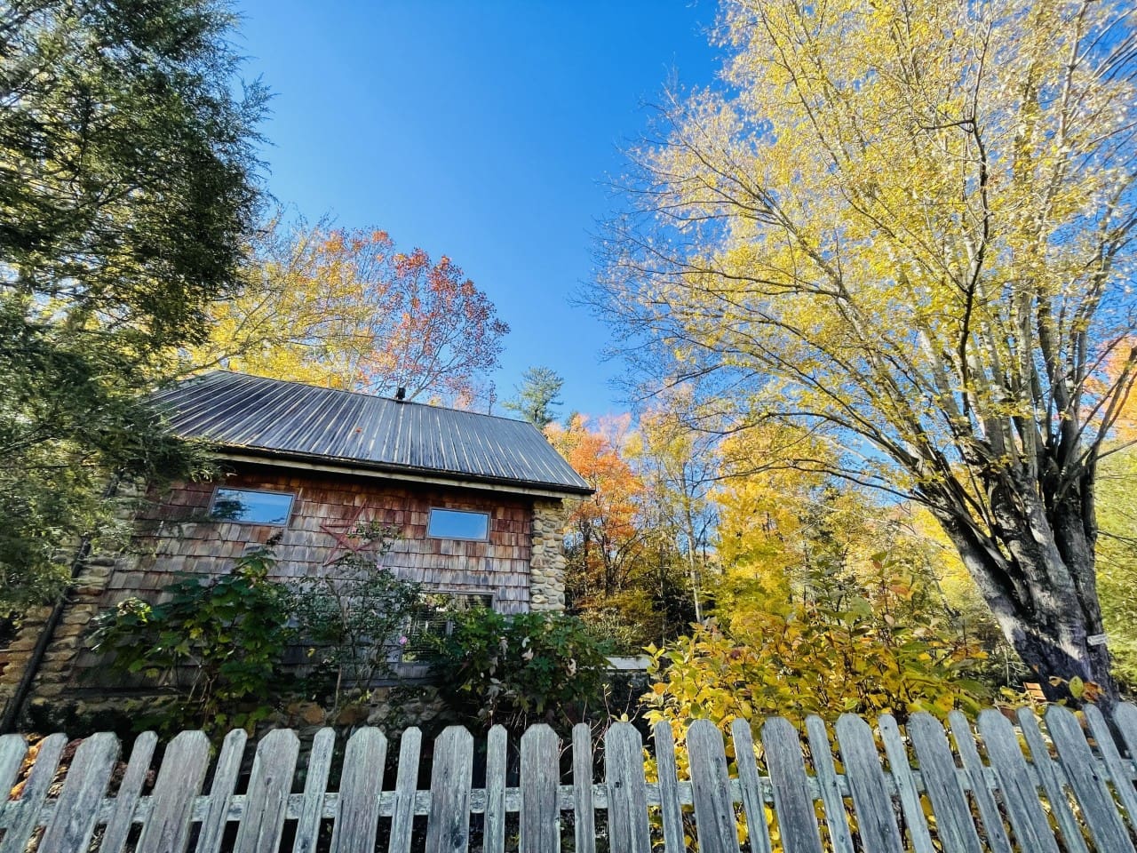 Street view of Stone Cottage in the Fall