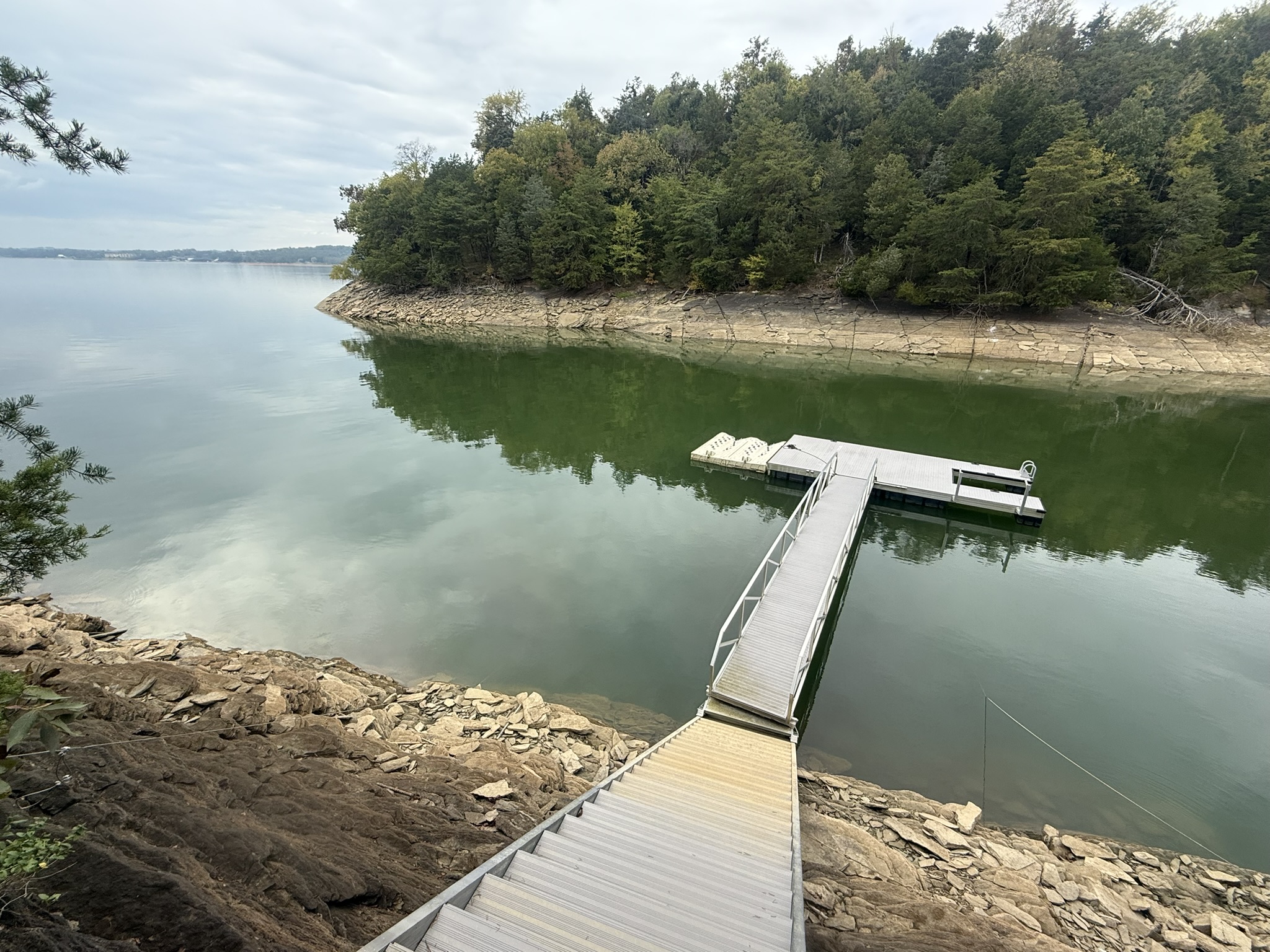 Dock in a private cove on back side of peninsula; gangway can be adjusted so that dock stays on water year-round