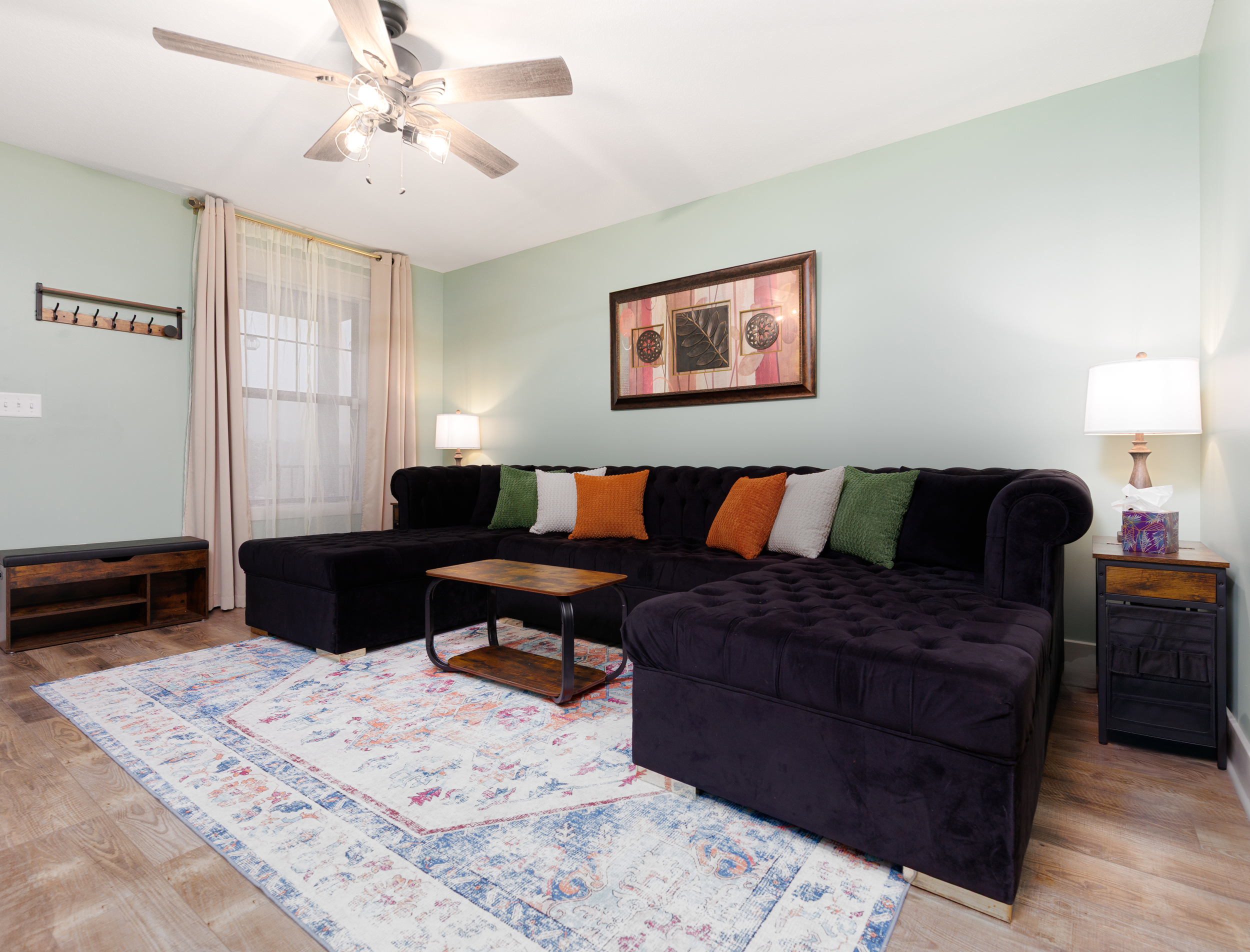 Inviting living room designed for comfort and connection, creating an ideal setting to unwind after a full day.