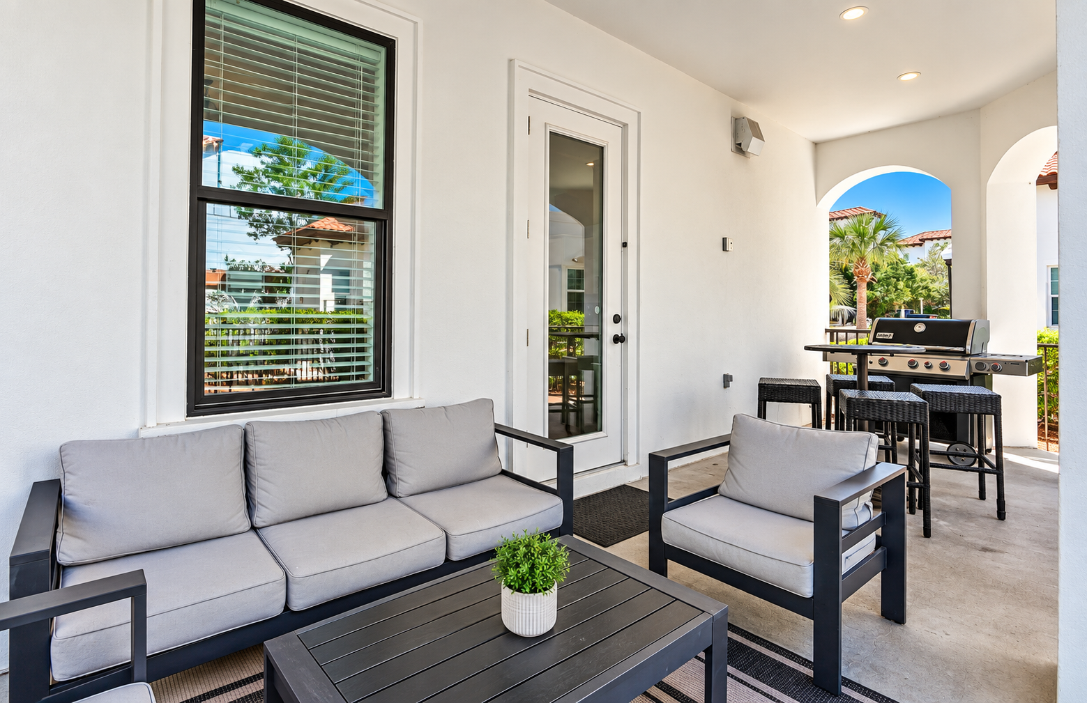 Covered Outdoor Lounge with Grill Area