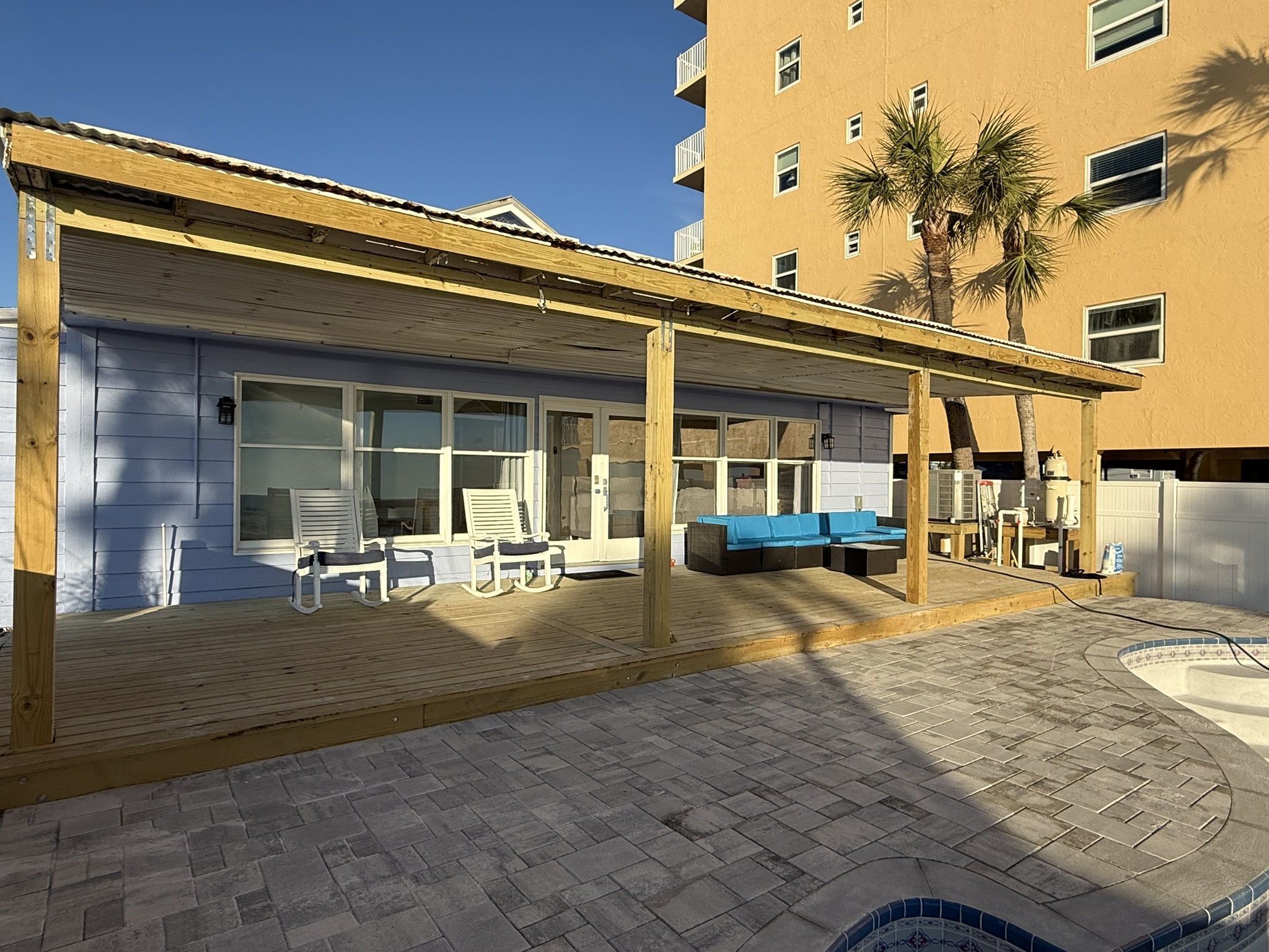 Large Private Deck with Rocking Chairs and Couch Seating.