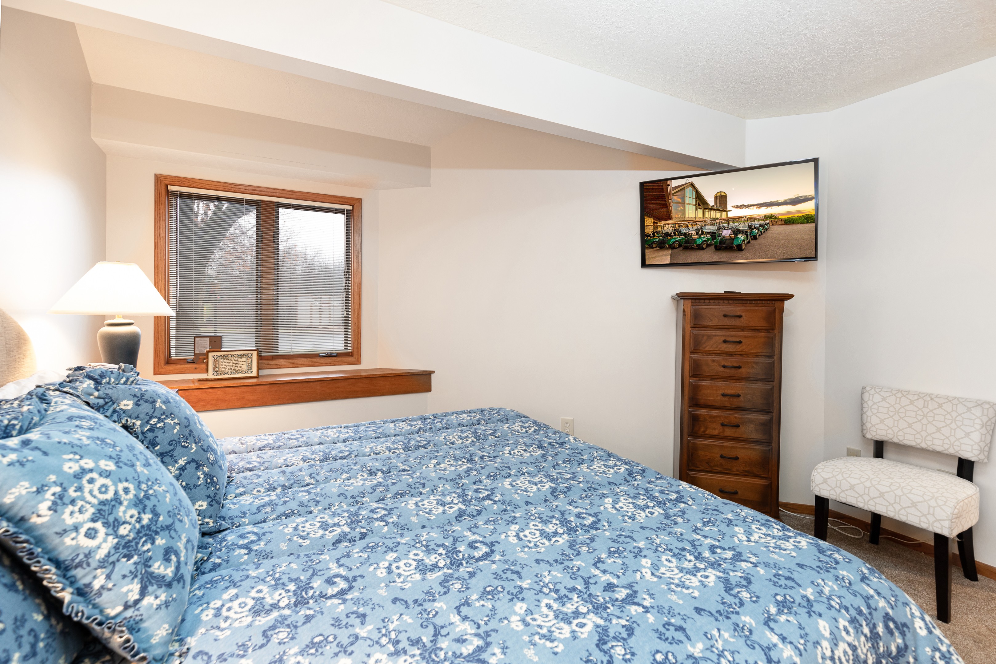 Main floor bedroom features a King size bed and an ensuite bathroom