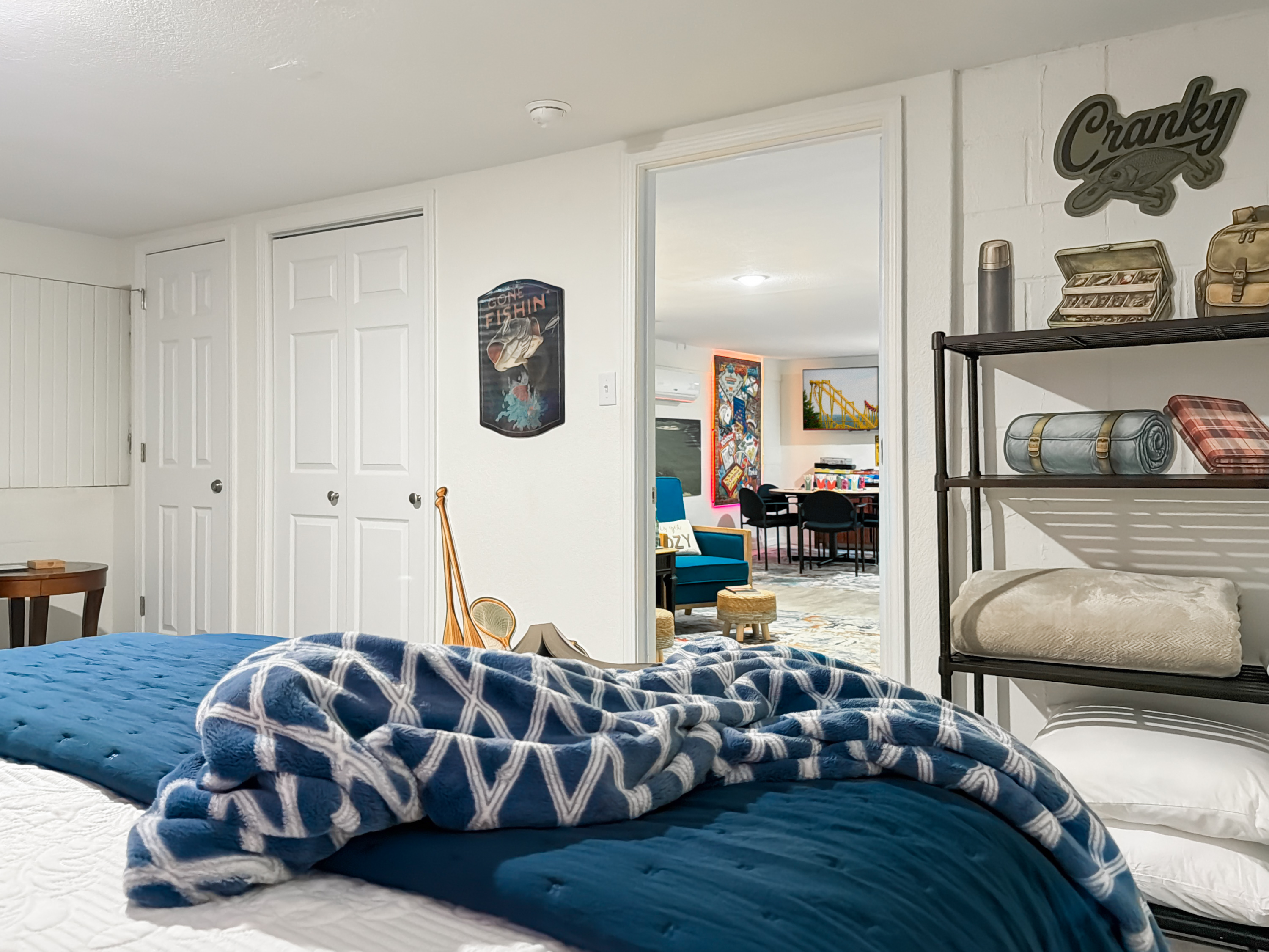 Turn in under the lake-sunset canvases — a restful queen that sends everyone home rested.
