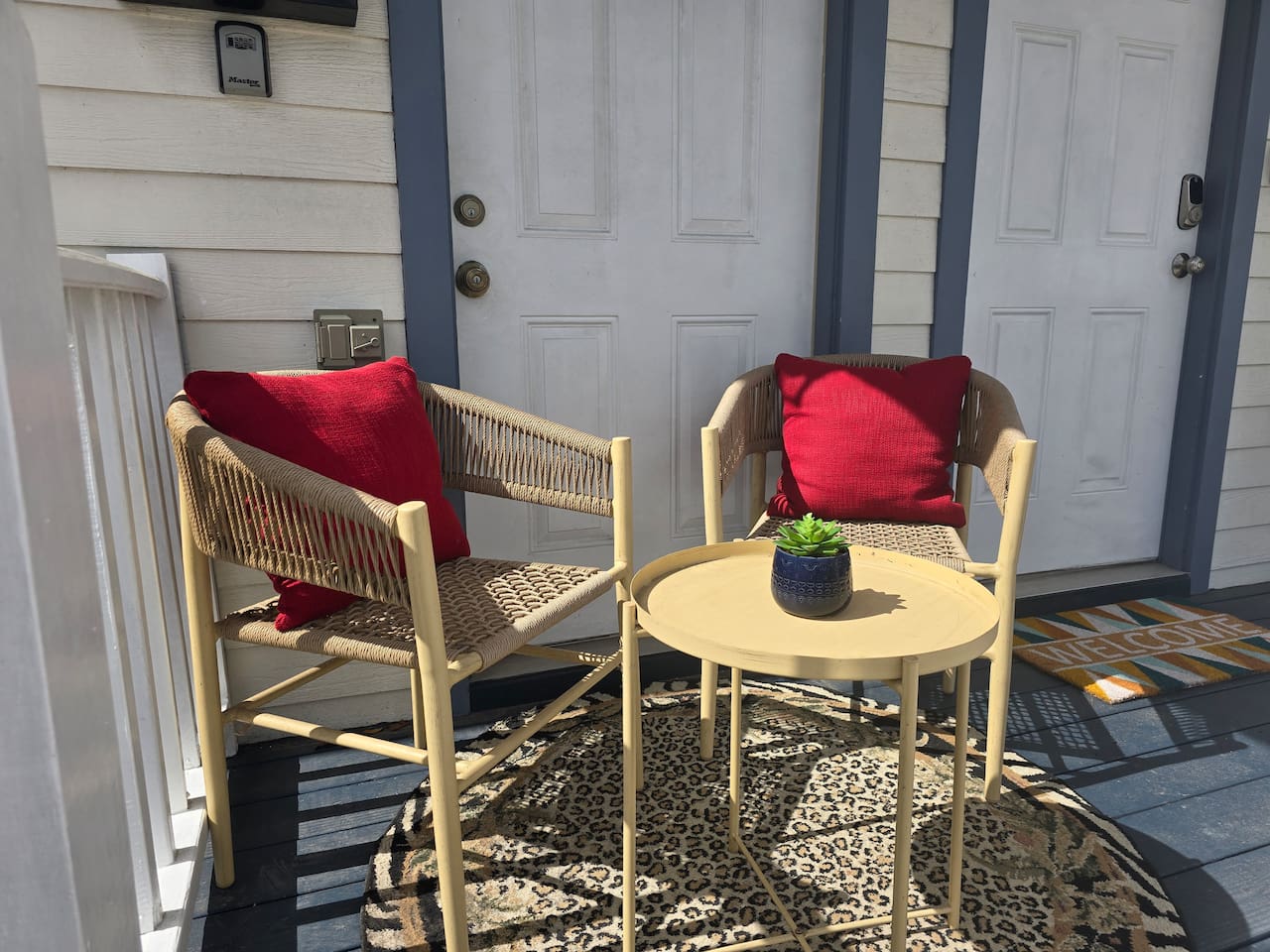 You won't be able to stop smiling as you enjoy tropical breezes and a beverage from the front porch. You'll see the runners and bikers, and maybe even a marching band, passing by on the greenway across the street!