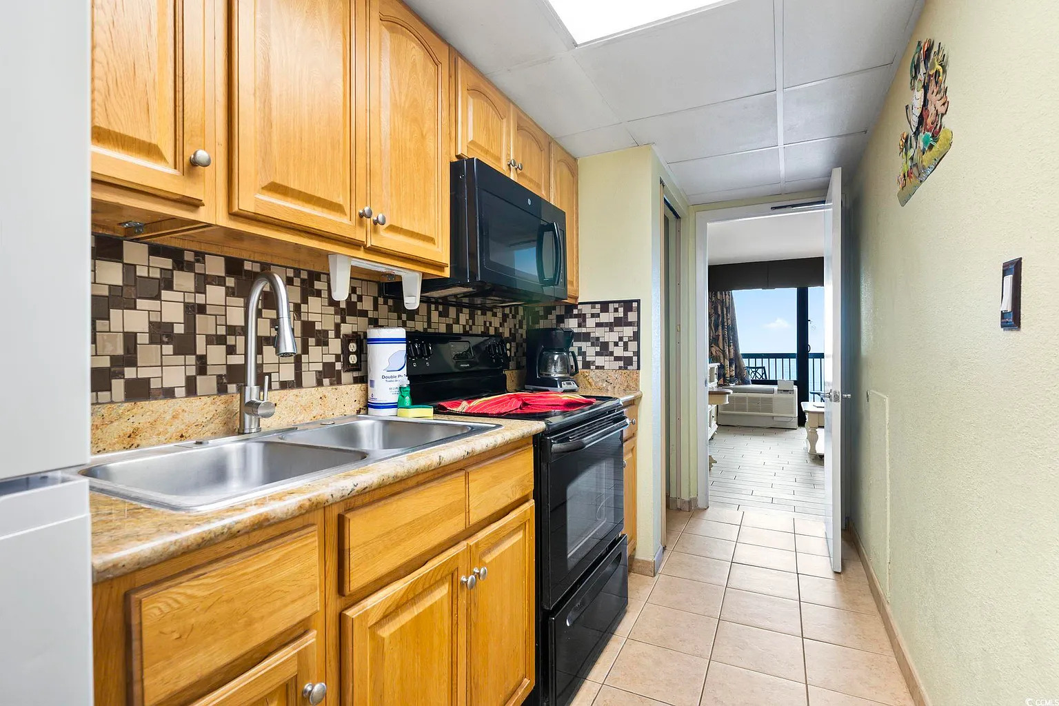 Bright and functional kitchen perfect for cooking after a day at the beach