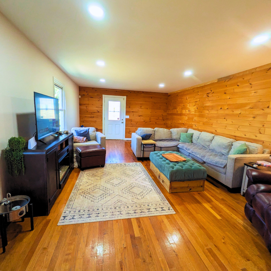 Relax in our bright and cozy living room — the perfect space to unwind after exploring the city, watch your favorite shows, or enjoy a quiet moment with family and friends.