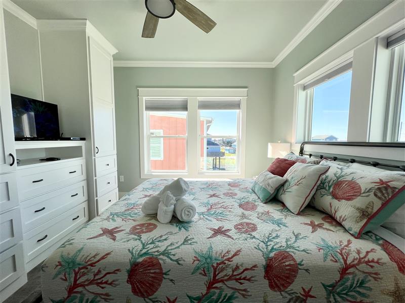 Crystal Paradise Bedroom 2: Refined queen bedroom with elegant finishes and Jack and Jill ensuite, offering both comfort and sophistication.