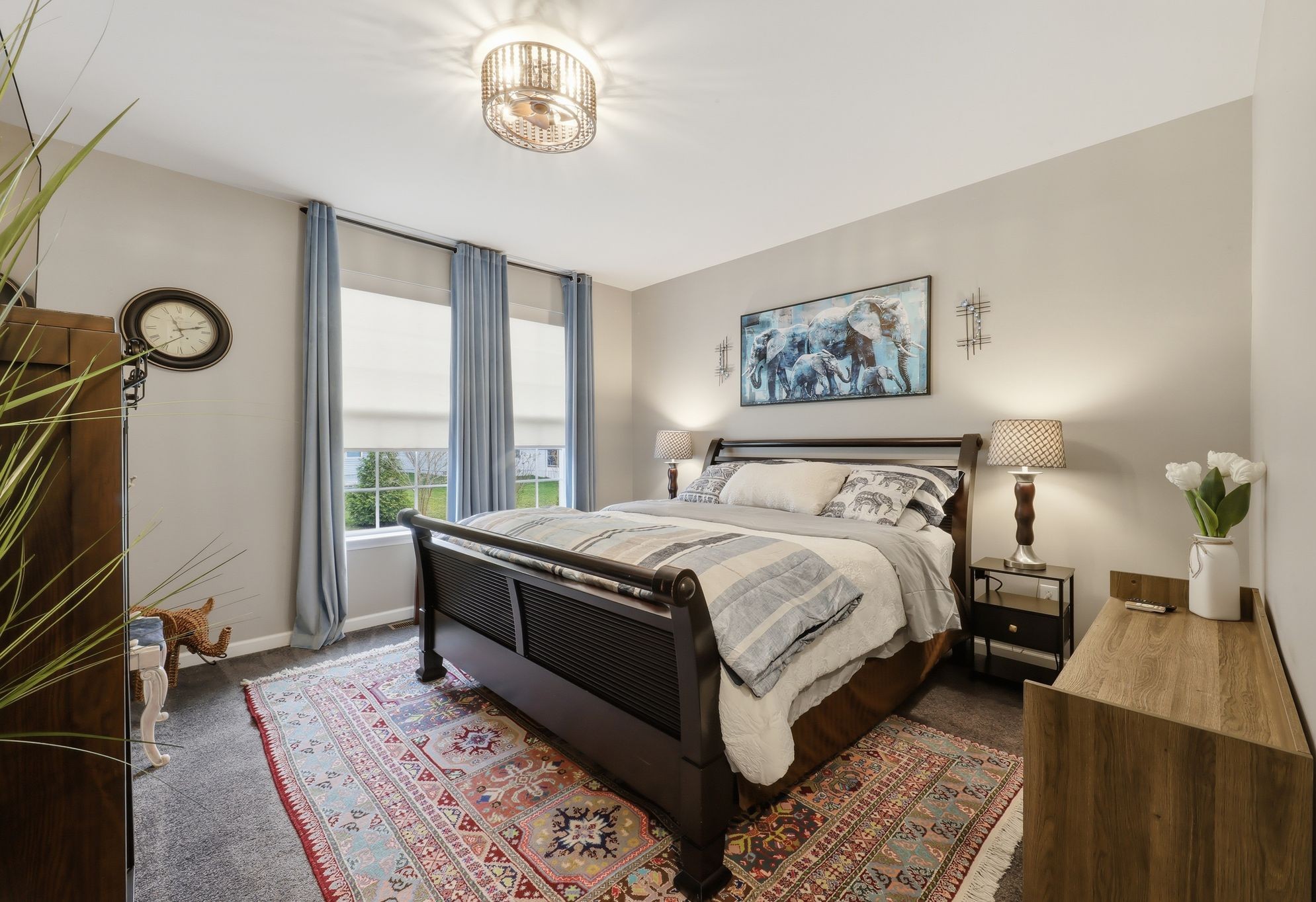 Bedside nightstands equipped with convenient charging ports, white noise machine and electrical outlets.