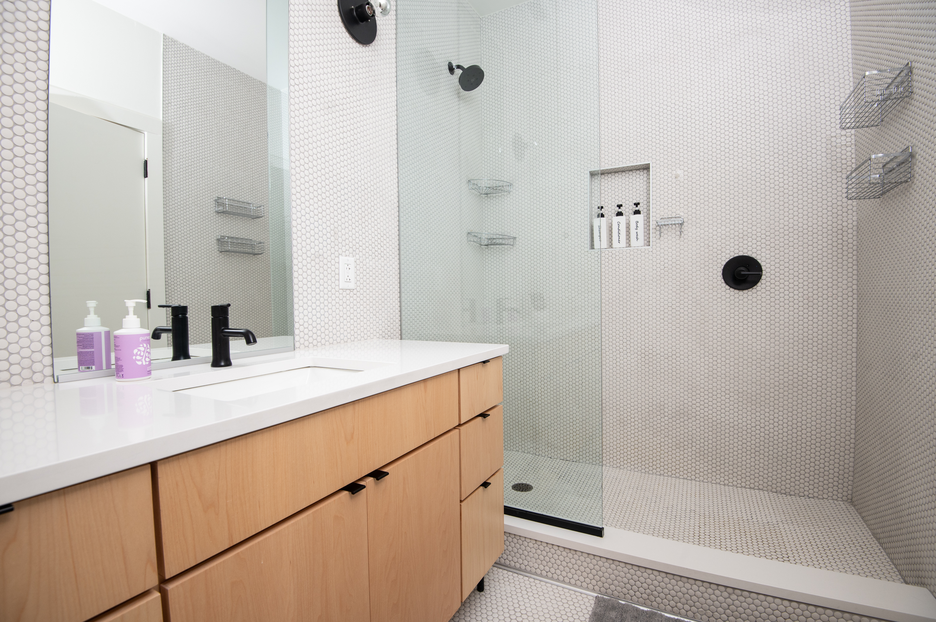 Modern bathroom with vanity and walk-in shower
