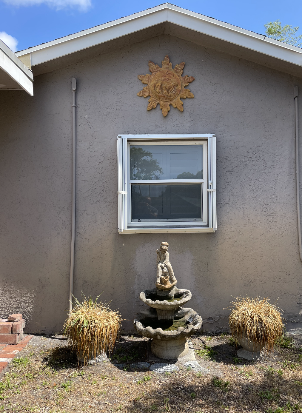 Enjoy the garden views and statuettes all around the property.