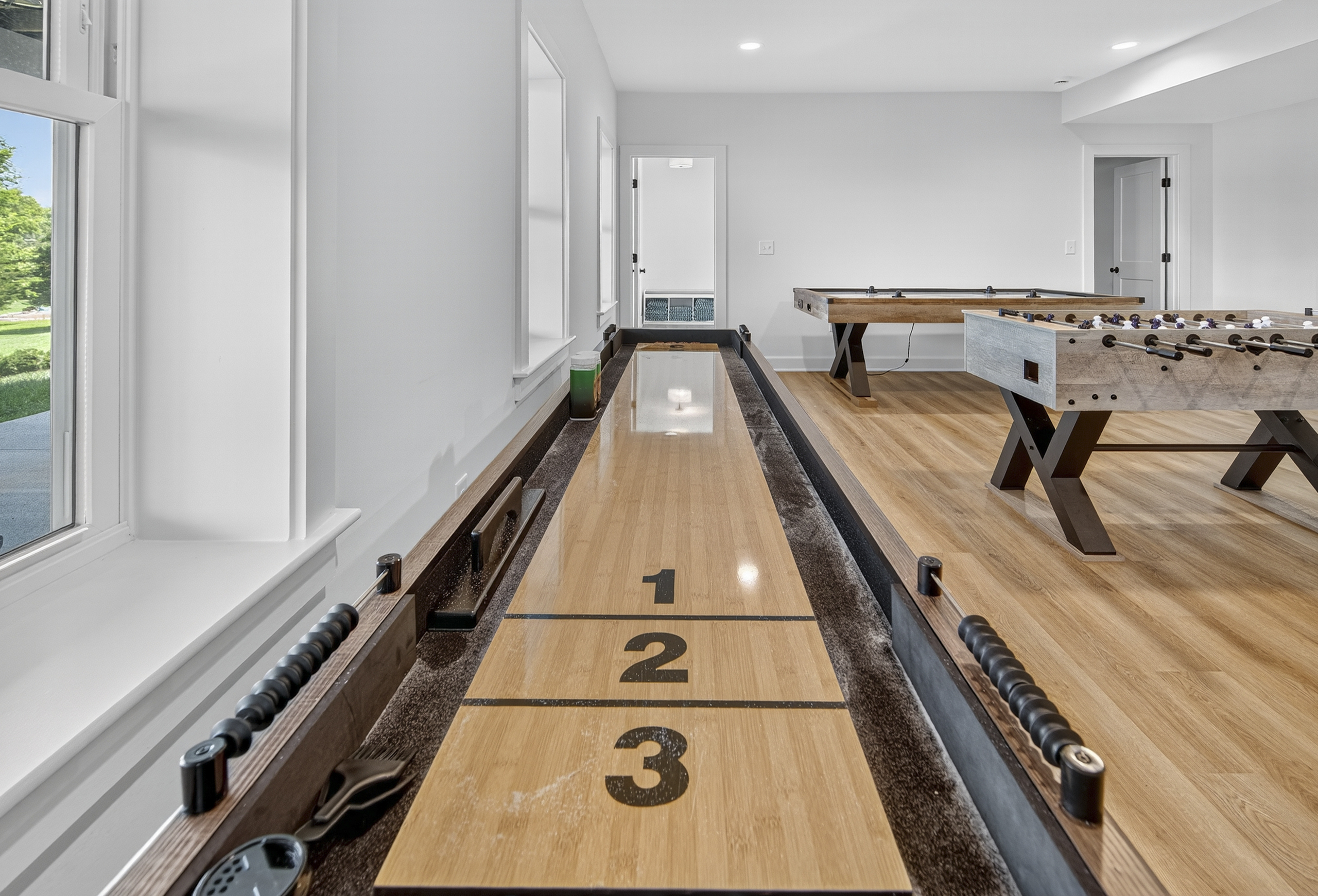 Challenge friends to shuffleboard, foosball, air hockey, or giant Connect Four—all with stunning lake views.