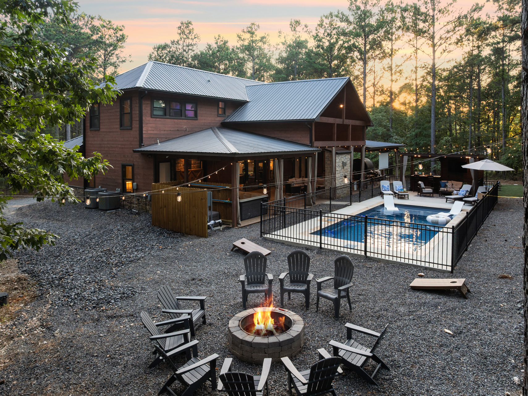 Step free access from the patio to the pool, cabana, 25x25 Turf Club, and outdoor spaces so everyone can comfortably enjoy the experience together at this resort-like retreat, Swim in the Pines. 🌲✨
