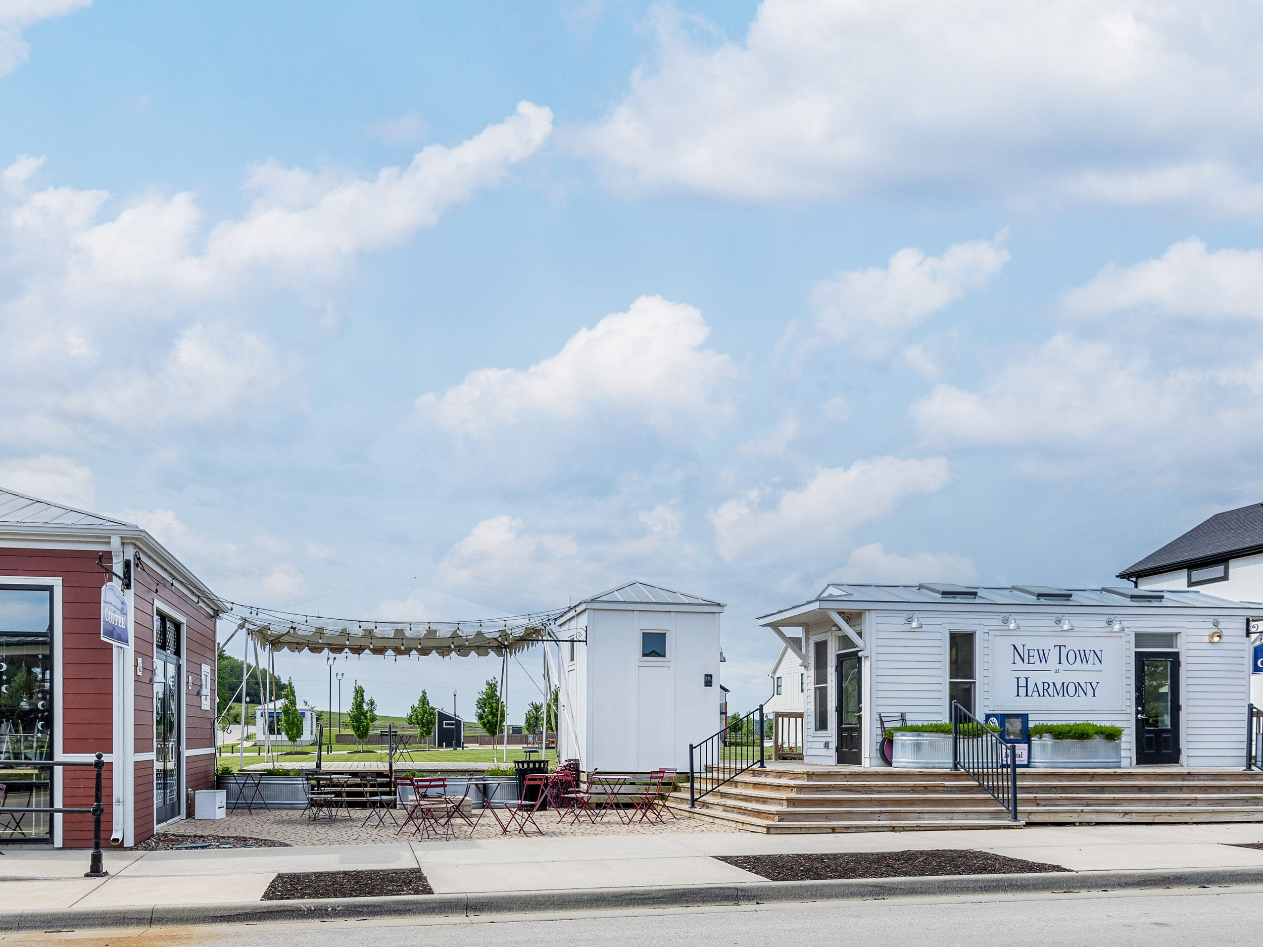 The neighborhood amphitheater hosts seasonal concerts and community events, while the surrounding shaded seating creates a relaxing place to gather and unwind.