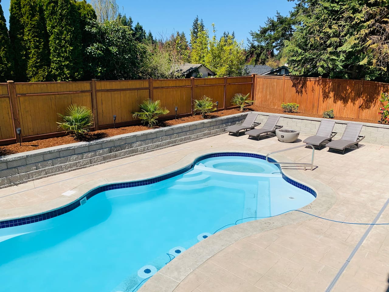 Welcome to the Pool in Edmonds Villa  . The main features are : New 2020, heated, private ,  water features like fountain,  hot tub , widely seating areas in pool and hot tub. Pool toys available for guest use.