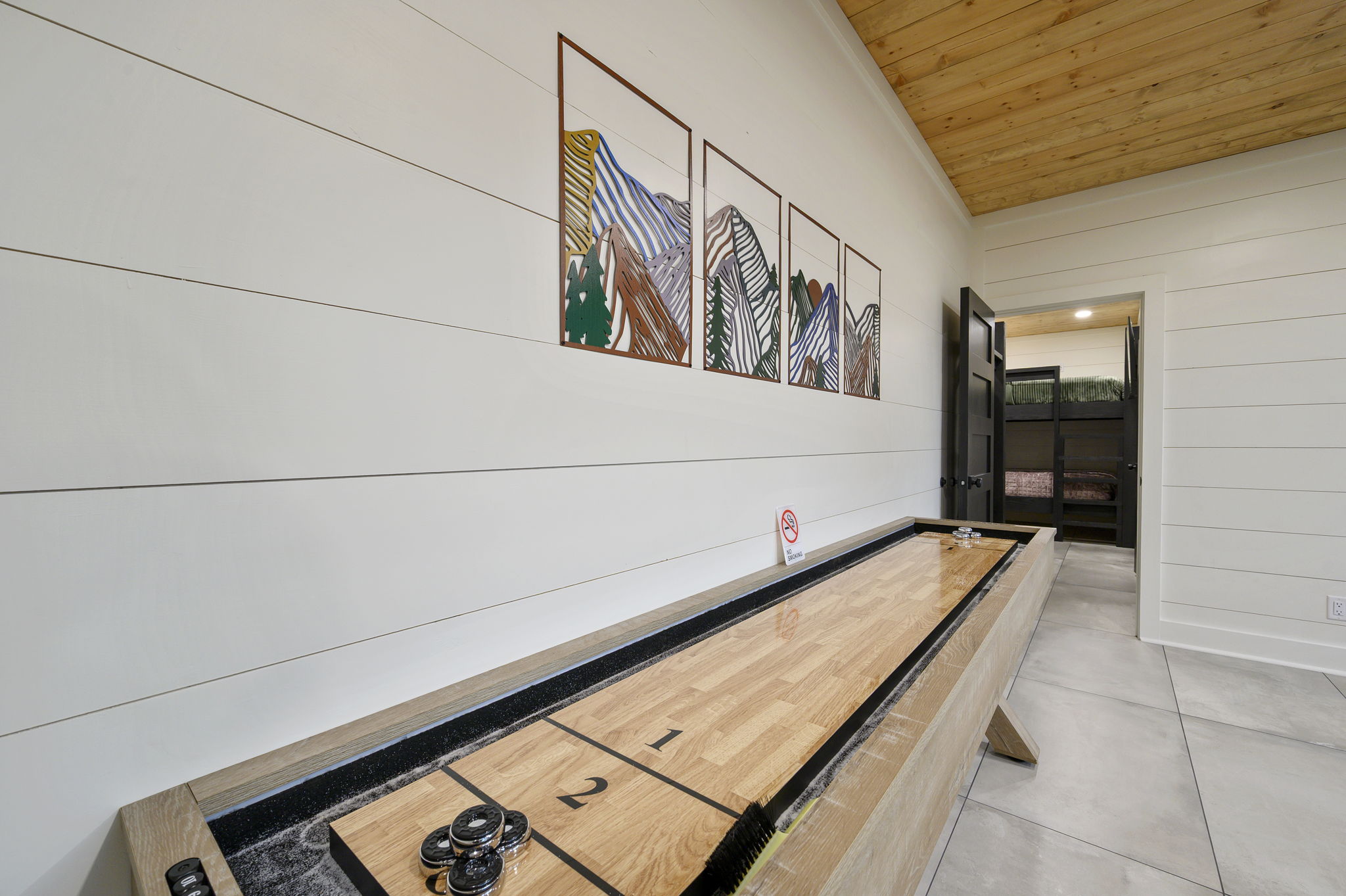 Challenge your crew to a round of shuffleboard—perfect for a little friendly competition during your cabin stay.