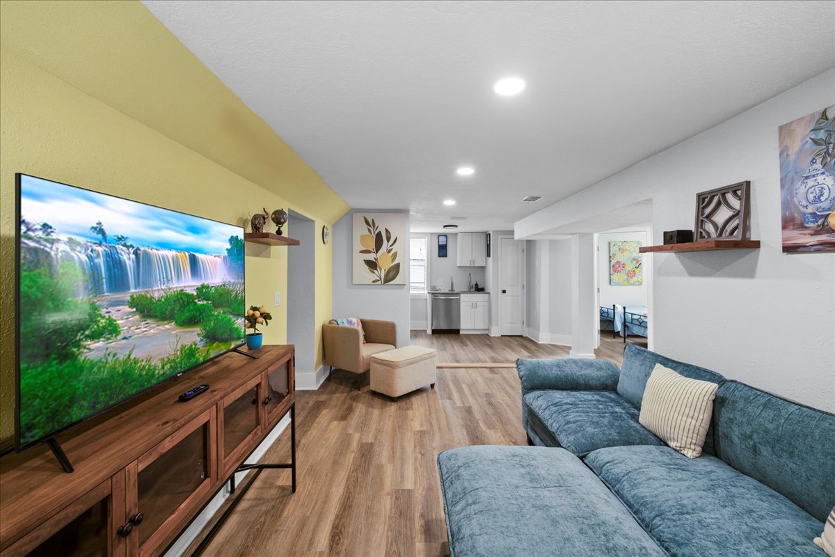 Open living area with modern finishes throughout the apartment! Relax and kick up your feet after a long day exploring the nations oldest city