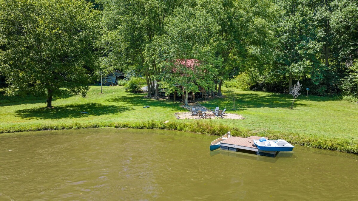 View of the from the water. Paddleboat and canoe at the property.