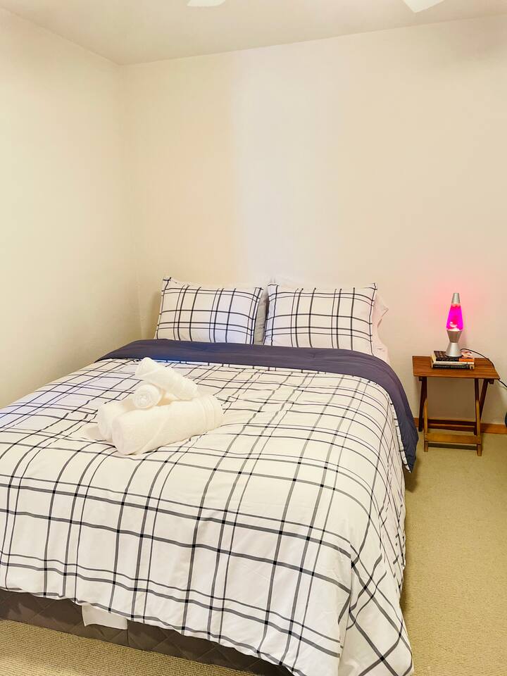Invinting bedroom designed for a peaceful night's sleep.
