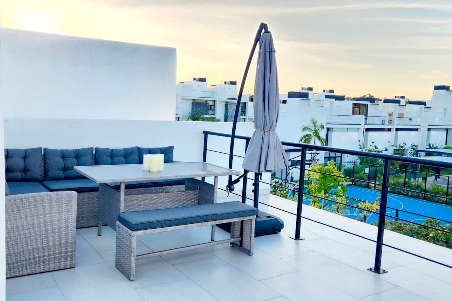 2nd Rooftop terrace seating area facing pool and gym 