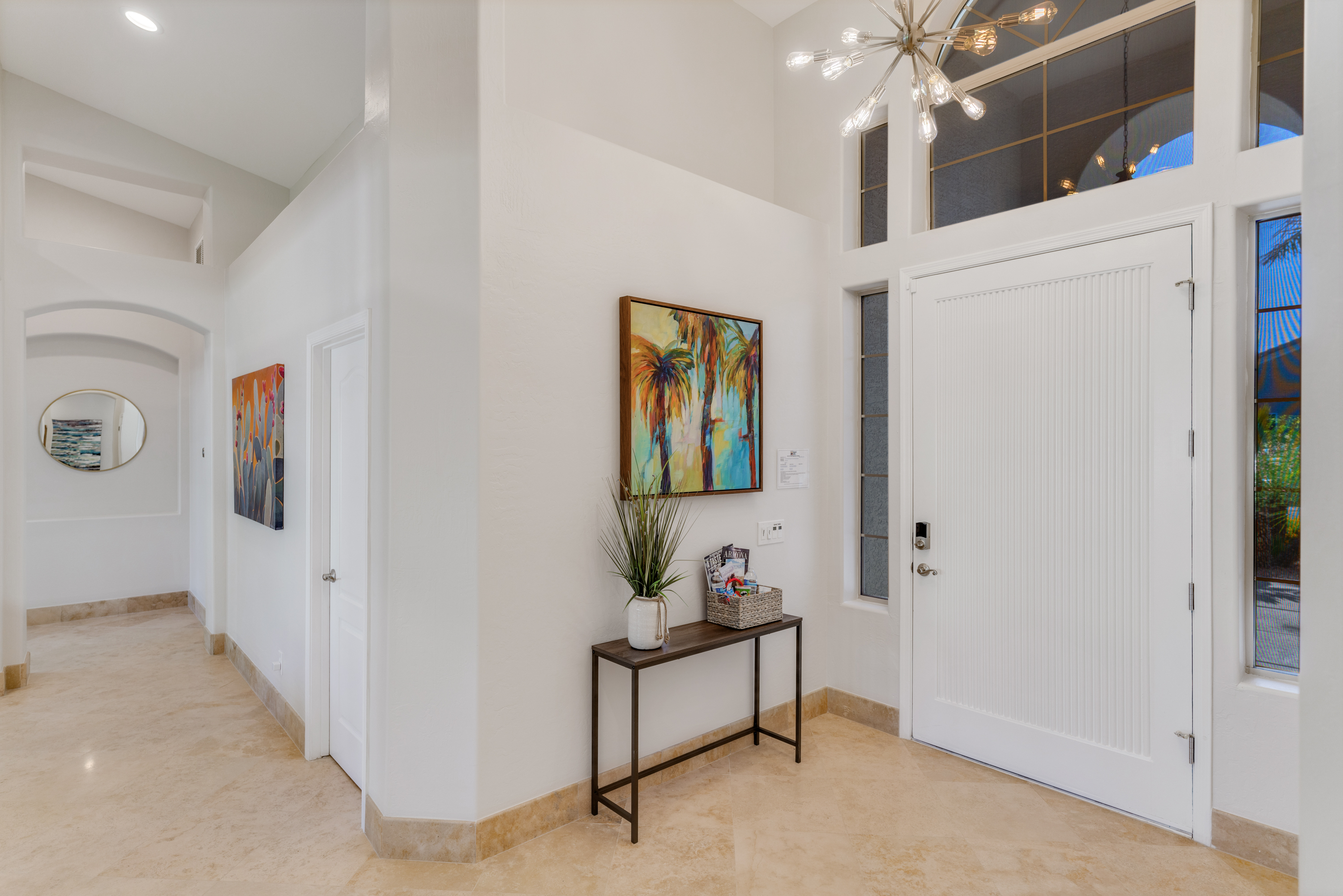 To the right of the front door, you'll find the laundry room with a full sized washer and dryer.