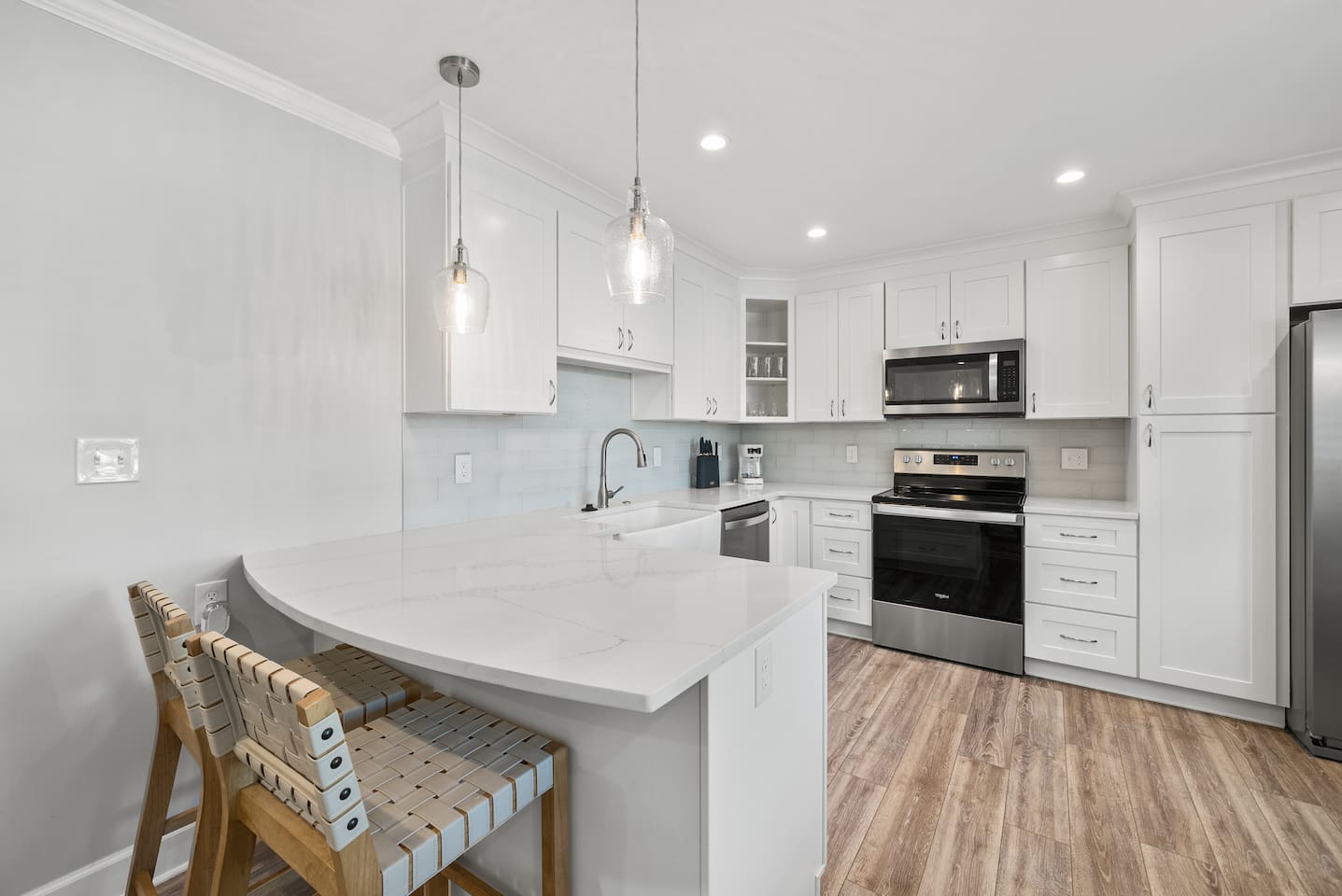 Open concept kitchen of Unit B. 