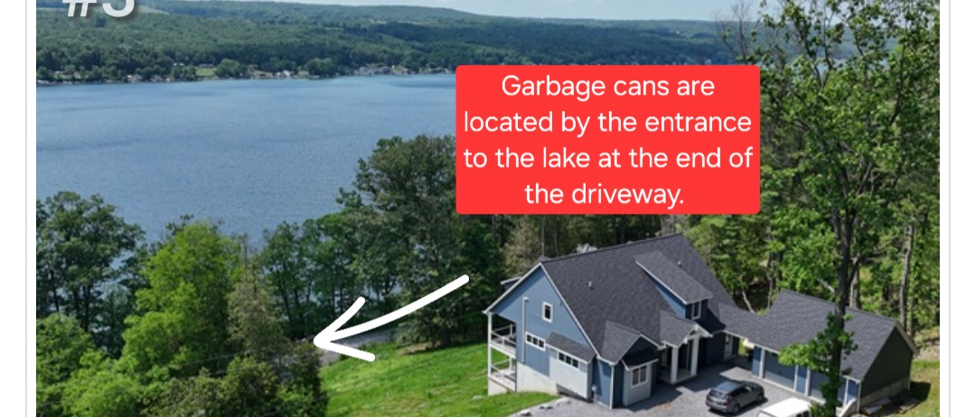 Trash totes are at the end of the driveway