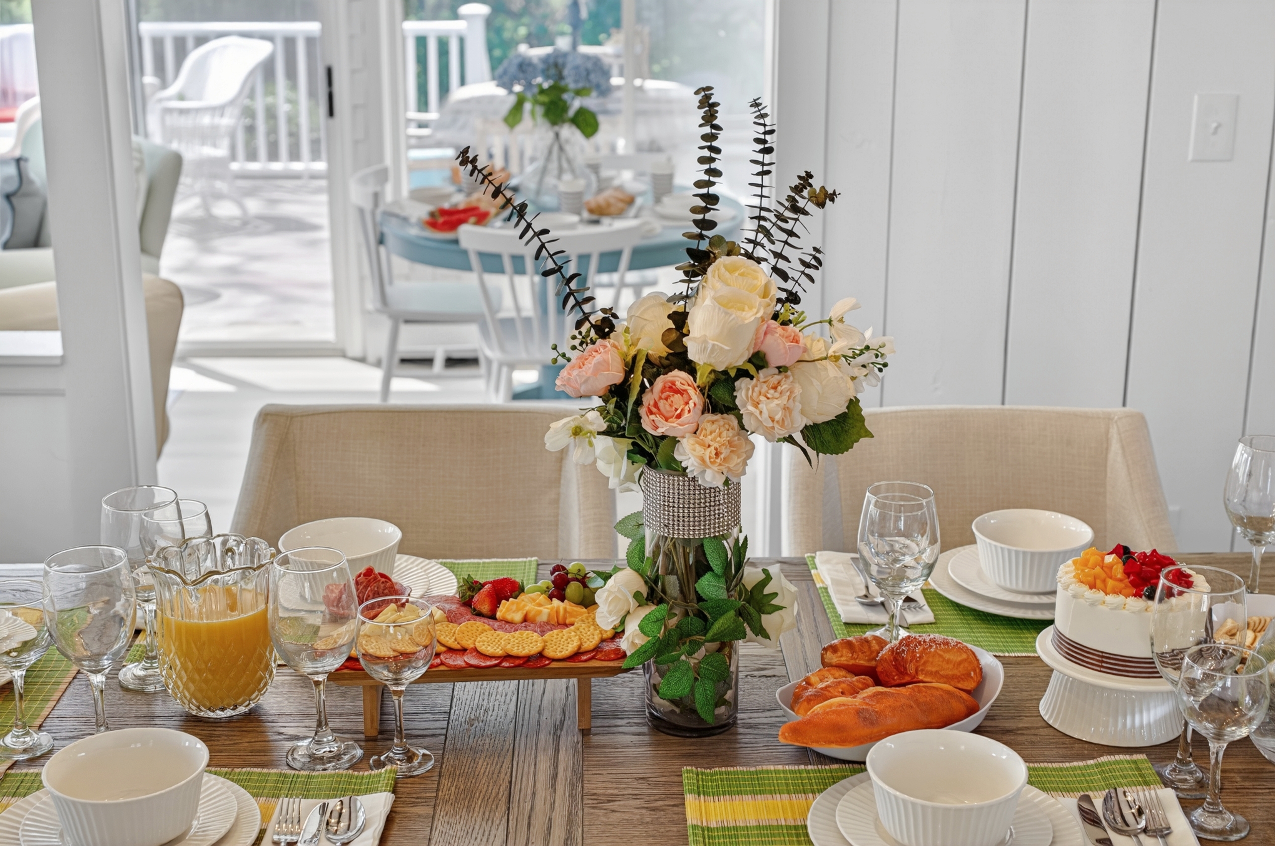 Welcoming dining space with a six-seat table setup and beautifully arranged cutlery for a refined dining experience.