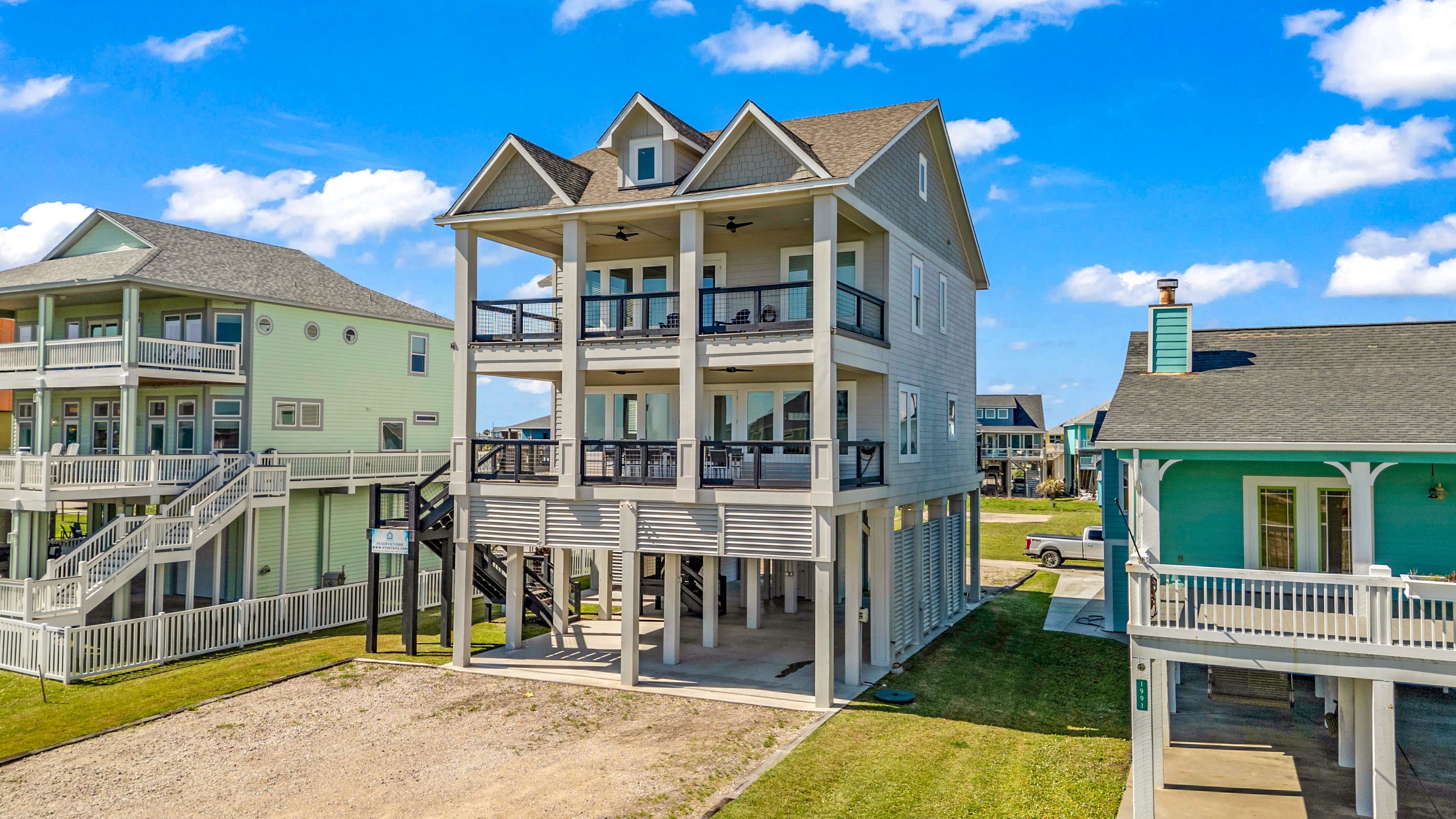 Costa Cristal Exterior: Elegant and contemporary, this home features bold architecture, large sunlit windows, and a refined exterior that captures both style and sophistication.