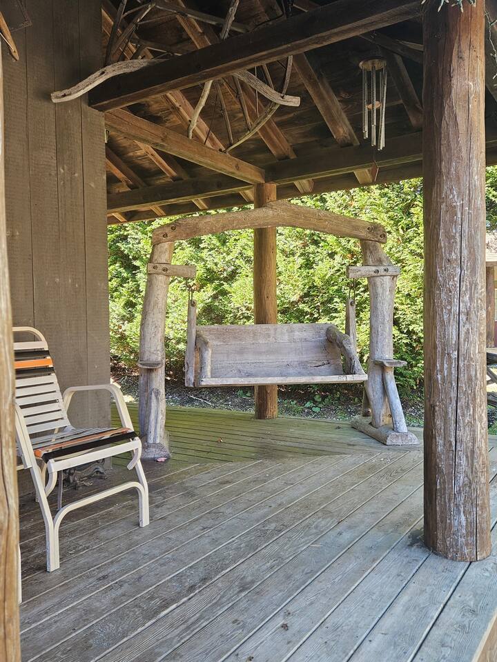 Enjoy the views from this amazing hand carved wood swing after a long soak in the hot tub! 