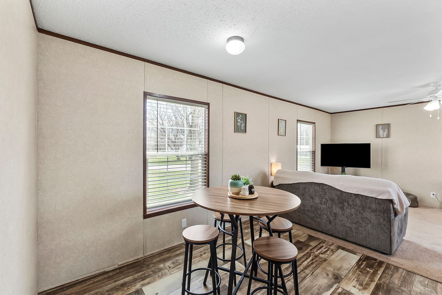 Bright and inviting dining space seamlessly connected to the living room—ideal for casual dining and social gatherings.