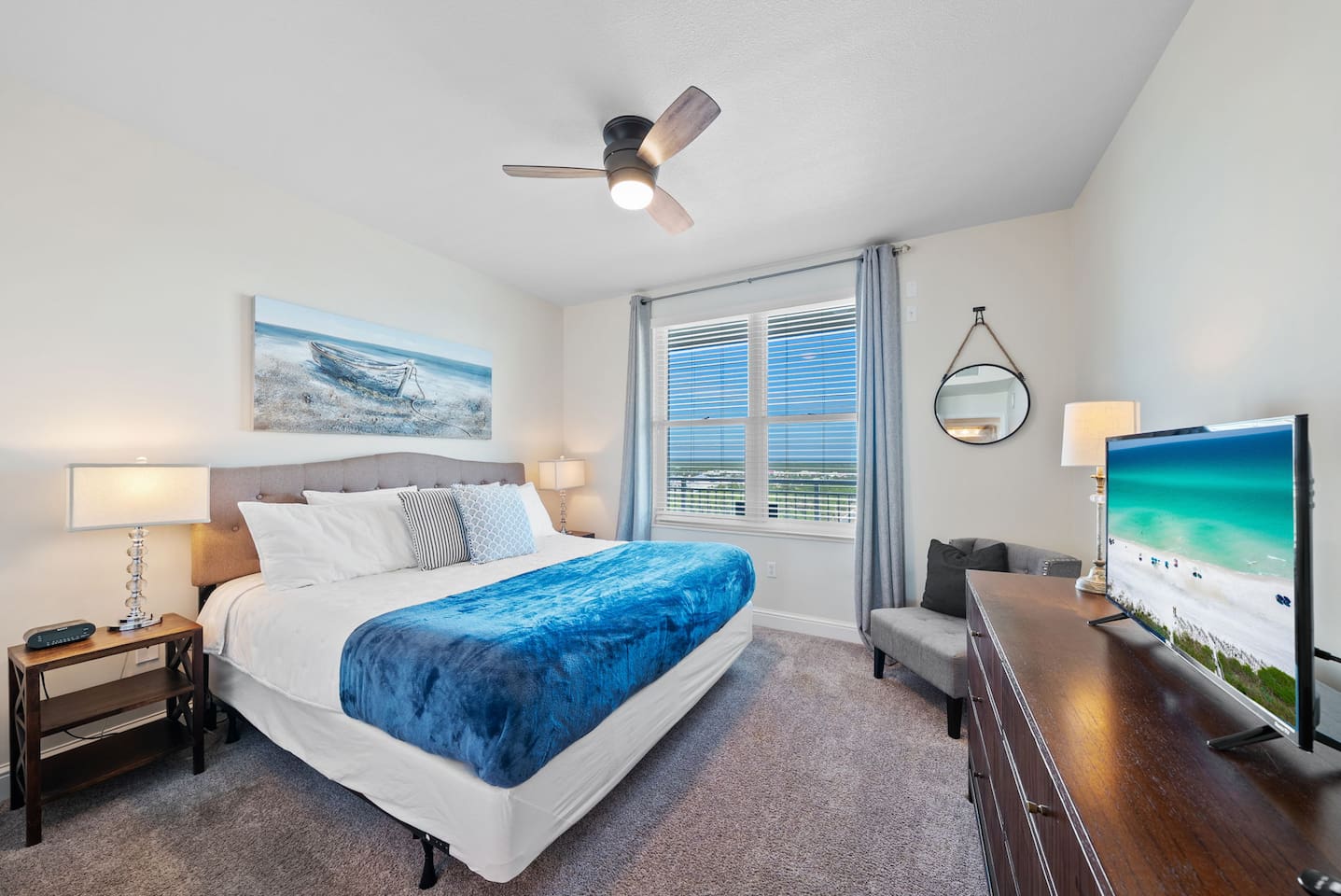 Spacious 2nd master king bedroom with city views from the window. Enjoy overlooking Front Beach Rd., TopGolf and the PCB Wheel in the distance.